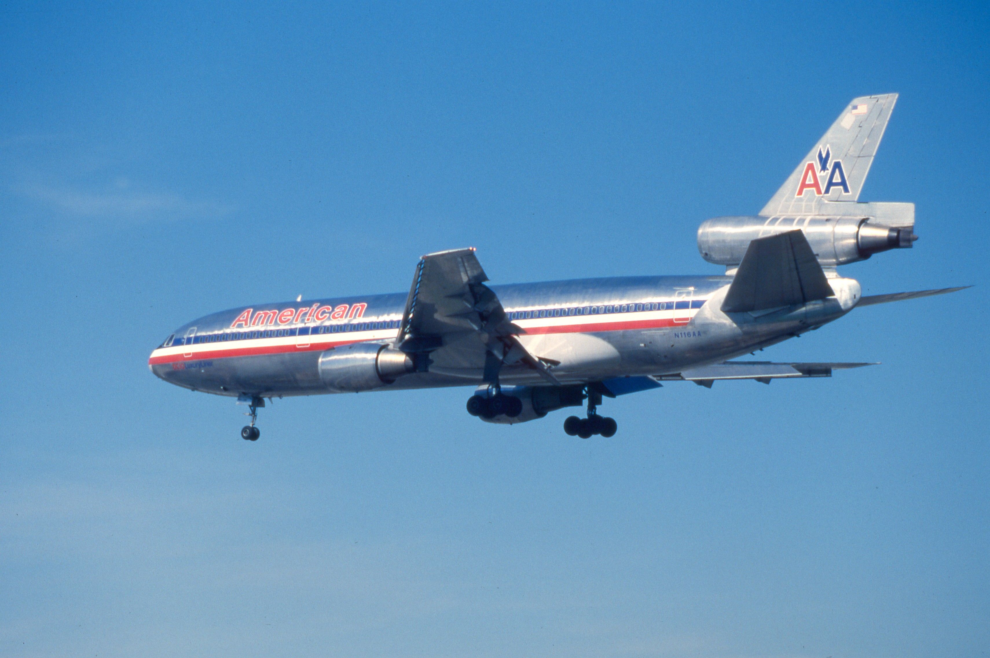 An American Airlines McDonnell Douglas DC-10 flying in the sky.