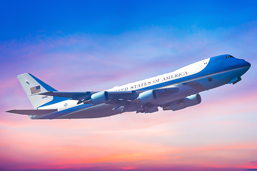 A Boeing VC-25 flying in the sky.