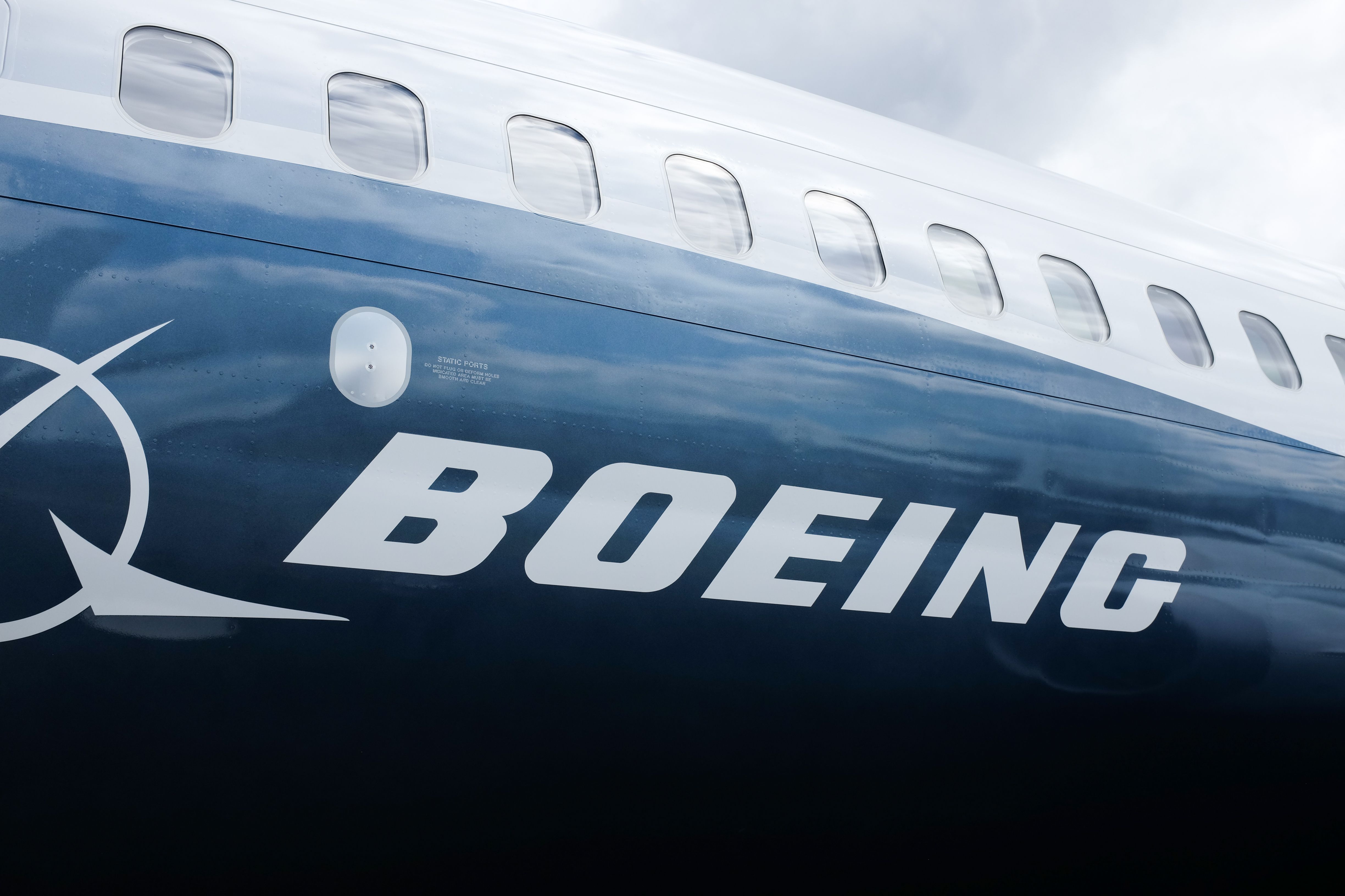 Boeing logo on the side of a fuselage of a Boeing 737 MAX shutterstock_1591001176