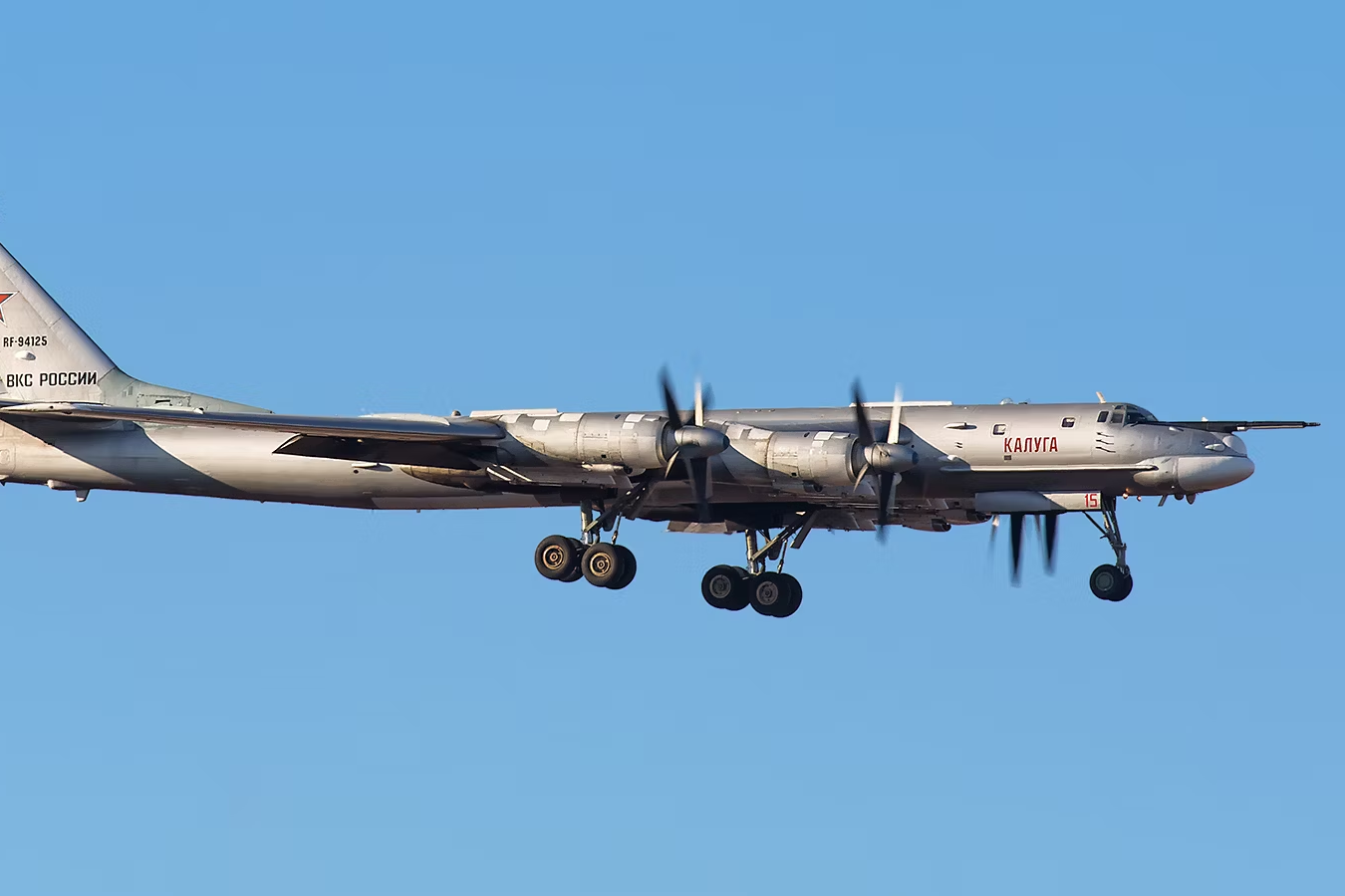 A Tupolev Tu-95 flying in the sky.