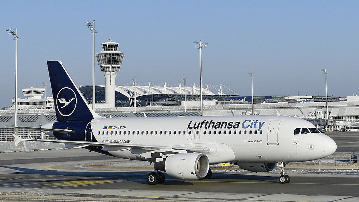 A Lufthansa City Airlines Airbus A319 on an airport apron.