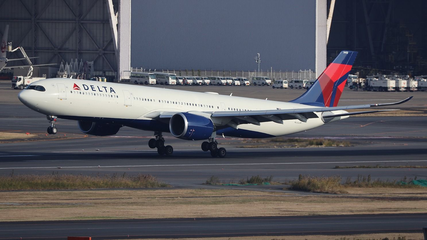 Delta Air Lines Airbus A330-900 at Tokyo Haneda Airport HND shutterstock_2292636243