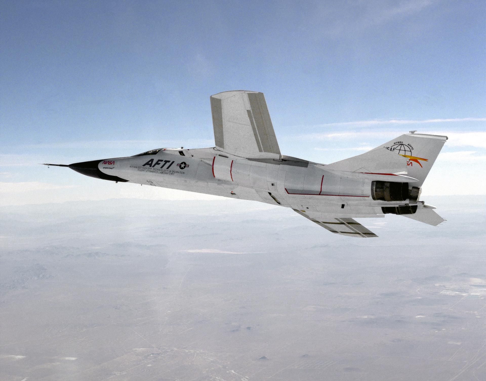 A NASA General Dynamics F-111 Aardvark flying in the sky.