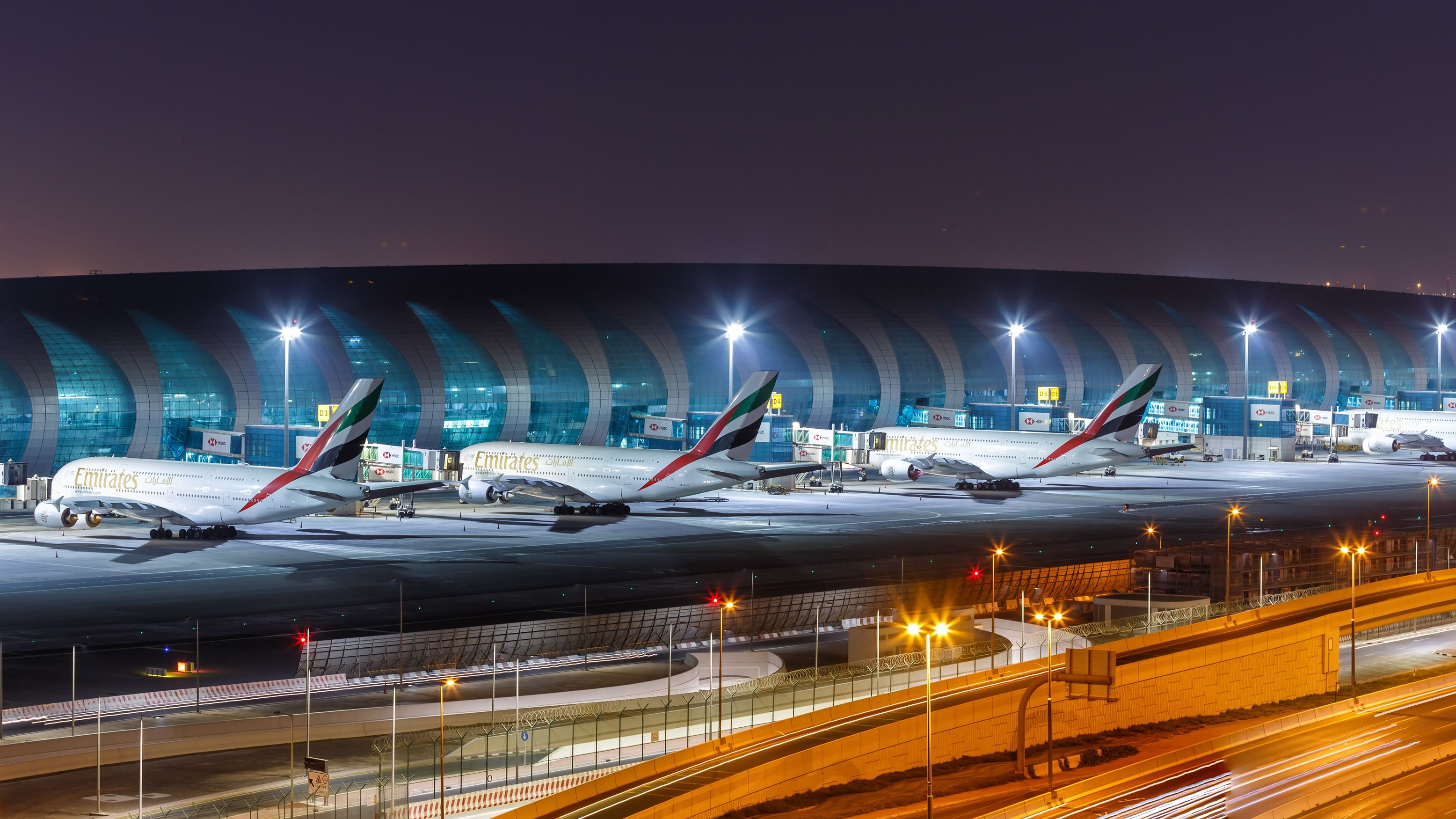 Emirates Airbus A380s at Dubai International Airport DXB shutterstock_1994899532