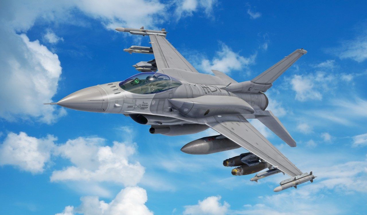 A render of an F-16 Block 70 flying in the sky.