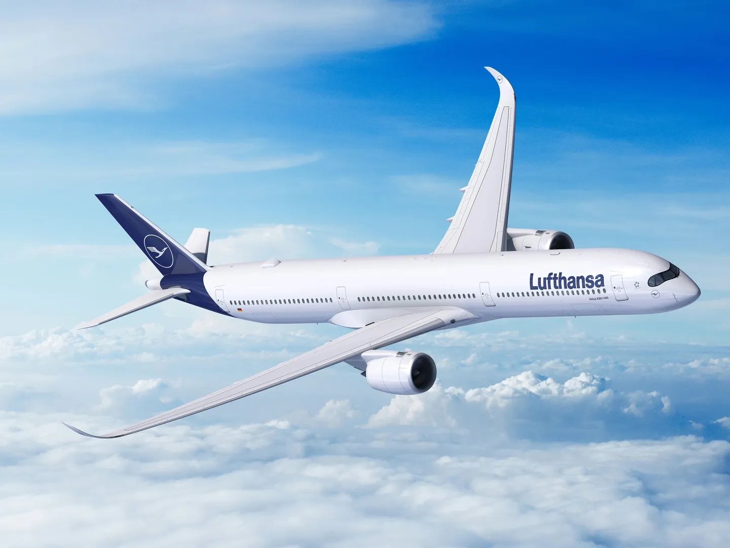 A Lufthansa Airbus A350-1000 flying above the clouds.