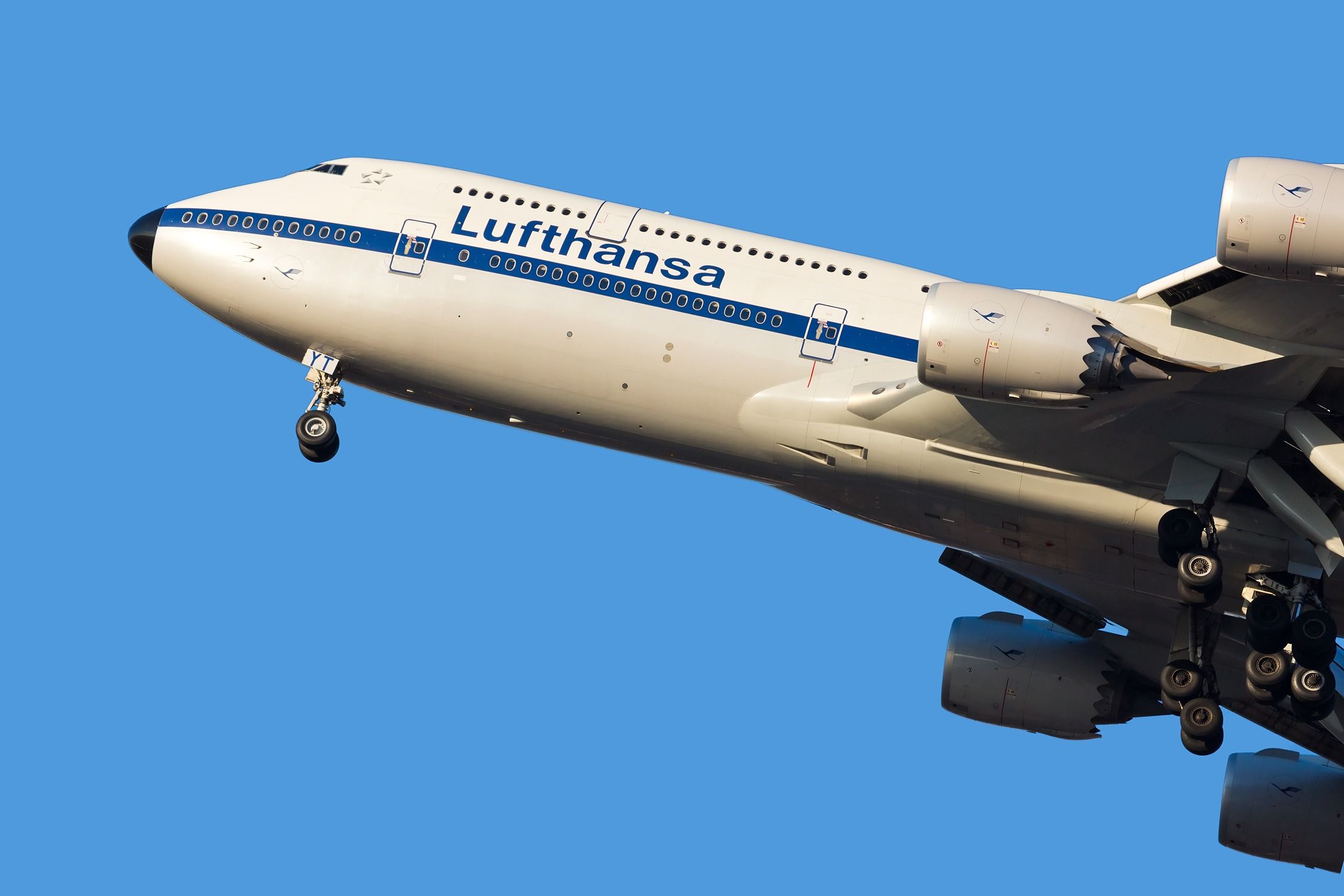 Lufthansa Boeing 747-8 with a retro livery landing shutterstock_1260600097