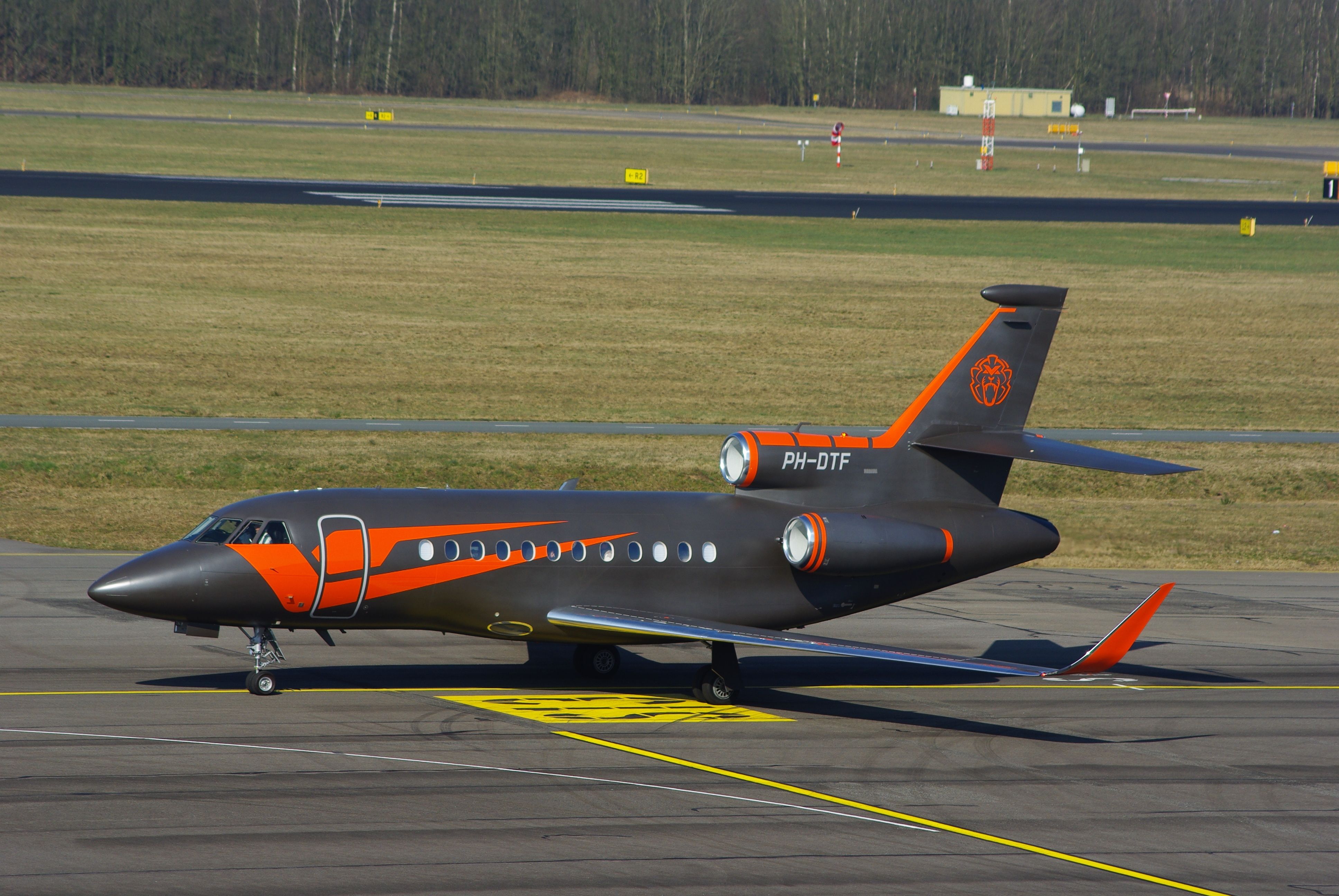 Max Verstappen Dassault Falcon 900EX private jet at Eidhoven shutterstock_2132944499