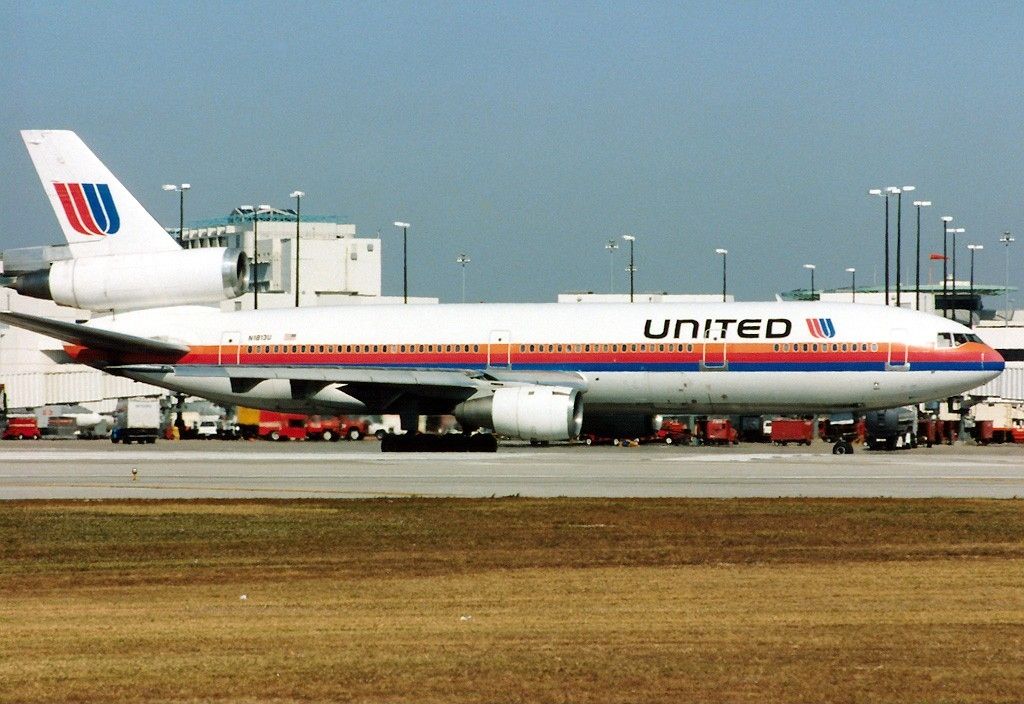 A United Airlines McDonnell Douglas DC-10 on an airport apron.