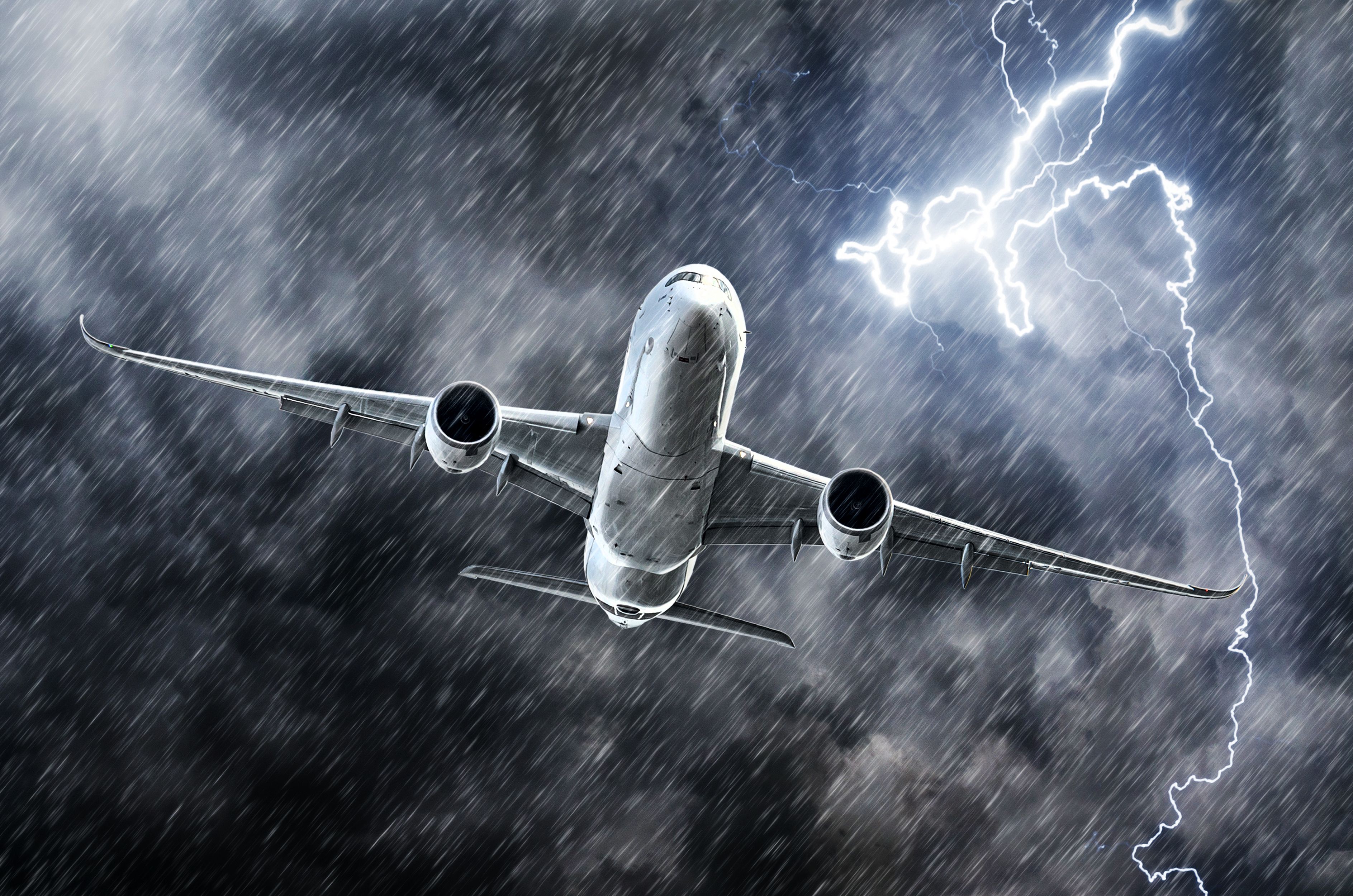 Powerful thunderstorm lightning strike and heavy rain in the sky passenger airplane_3_2_1055029697