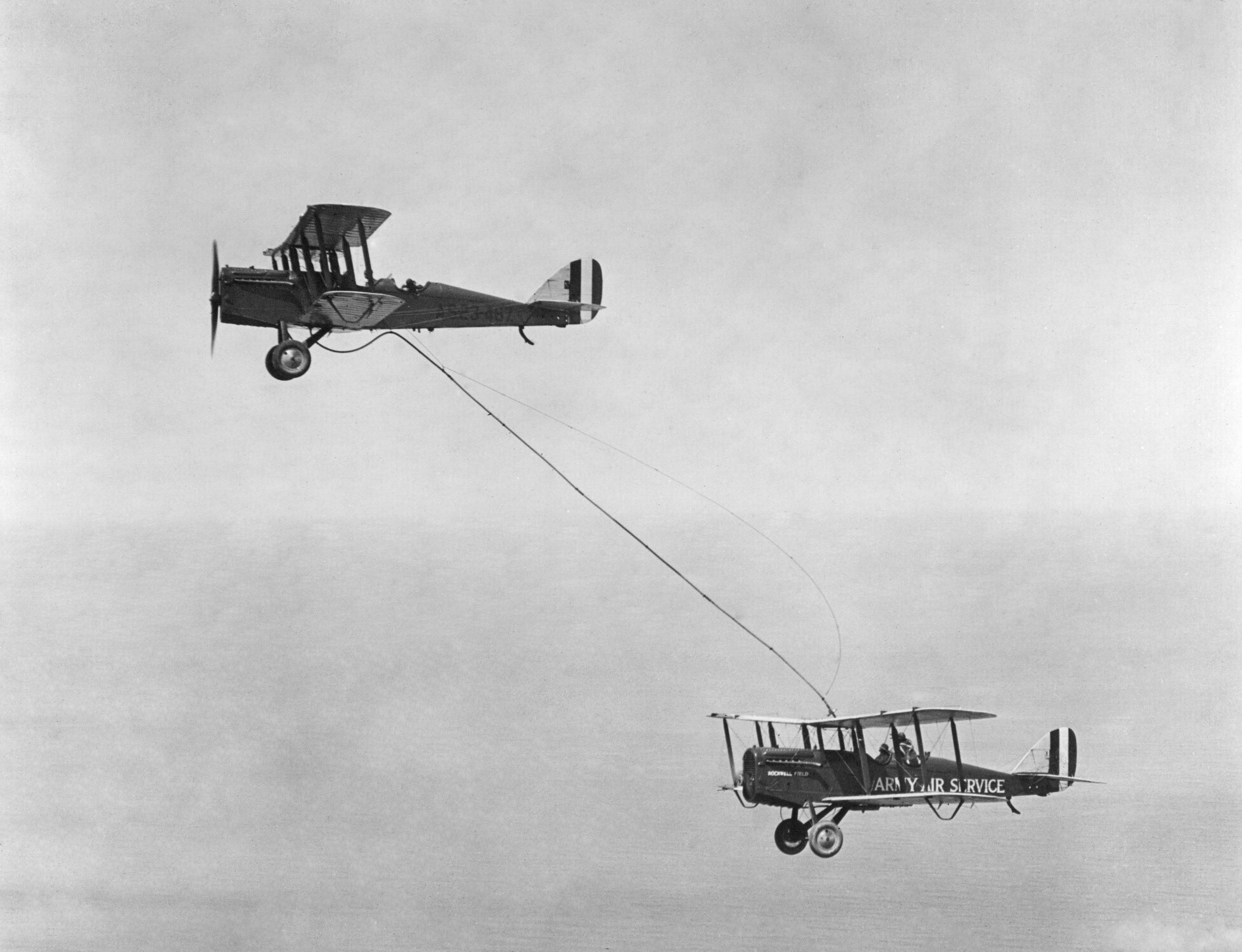 Capt. Lowell Smith and Lt. John P. Richter receiving the first mid-air refueling on 27 June 1923