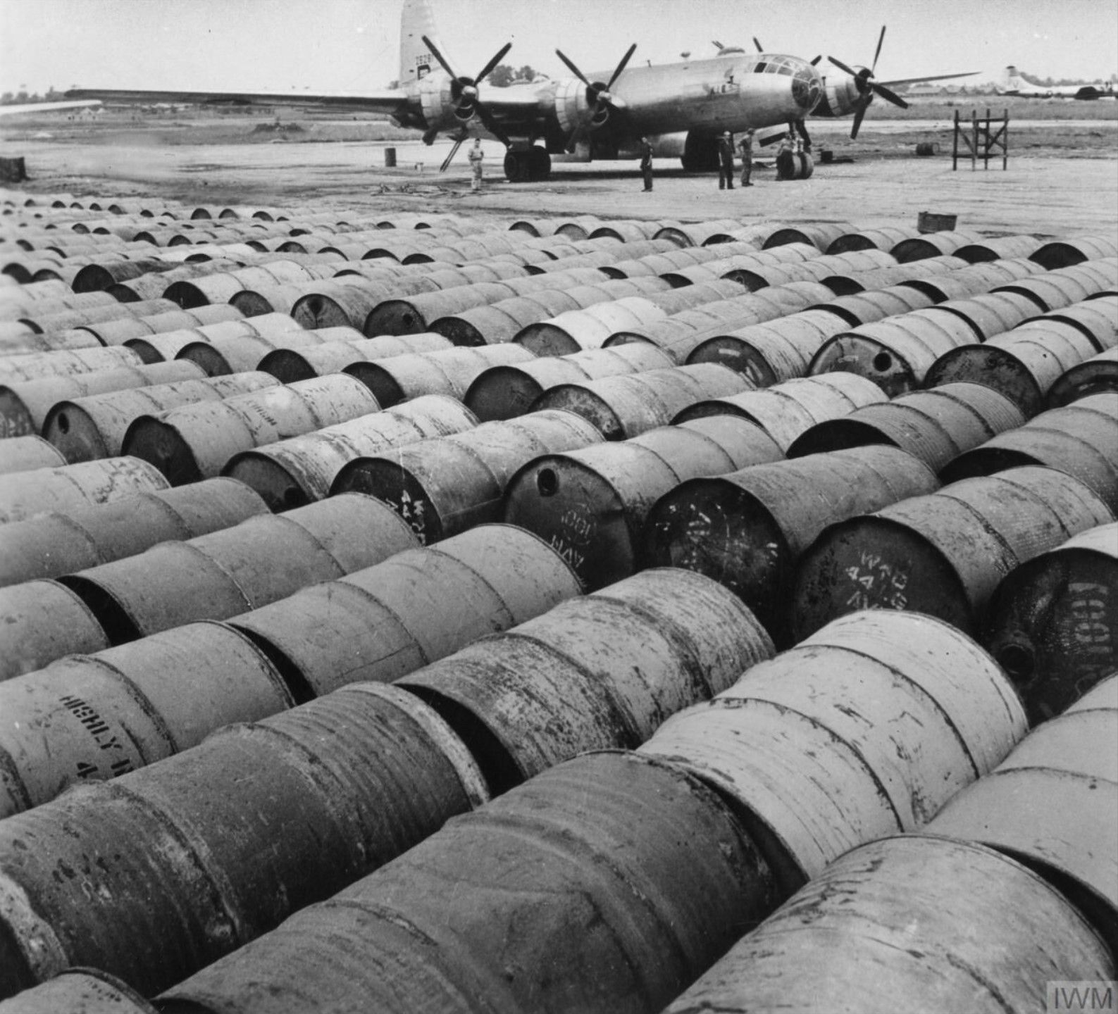 Fuel drums in front of a B-29 in China