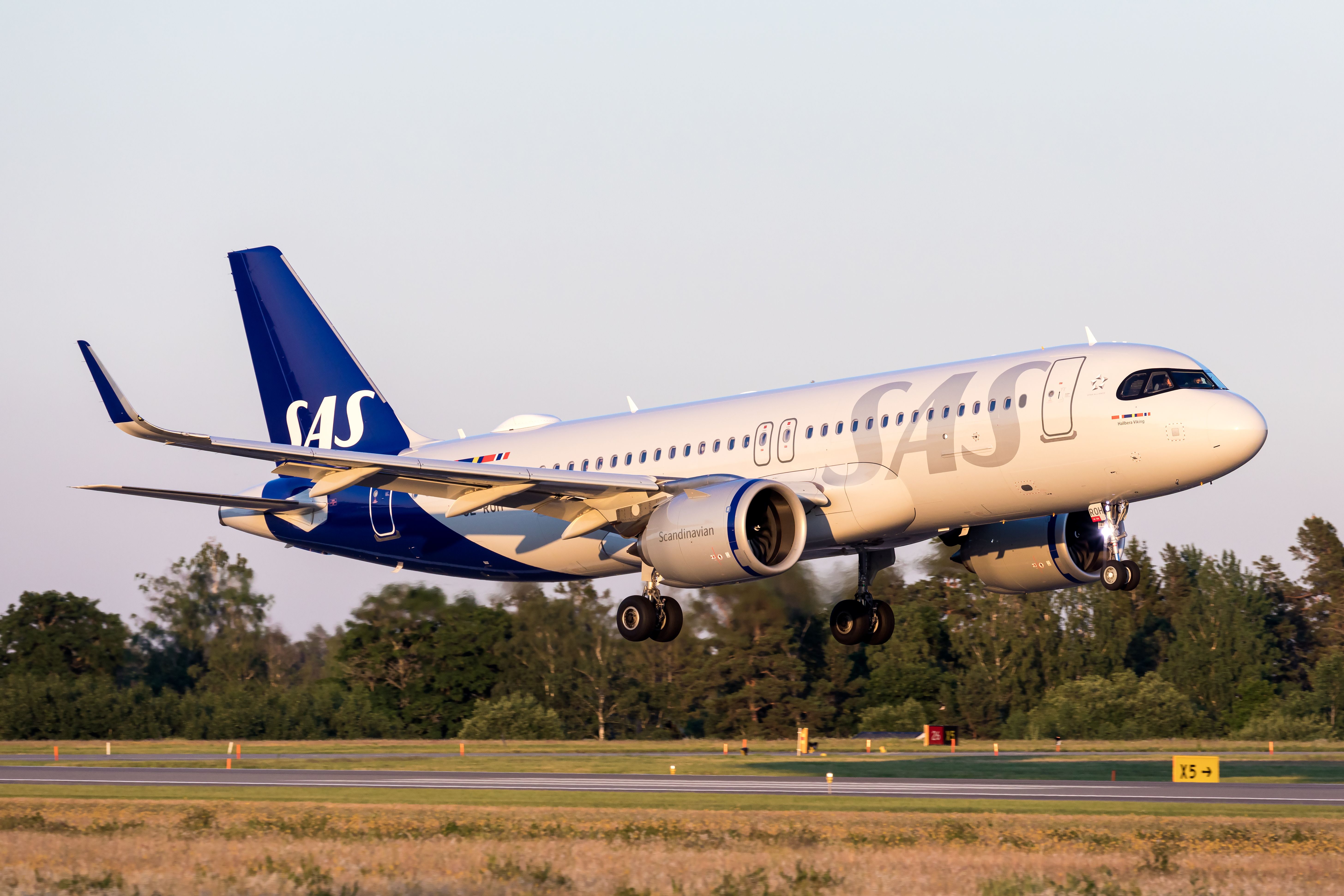 SAS Airbus A320neo landing at Stockholm Arlanda Airport ARN shutterstock_1768151204