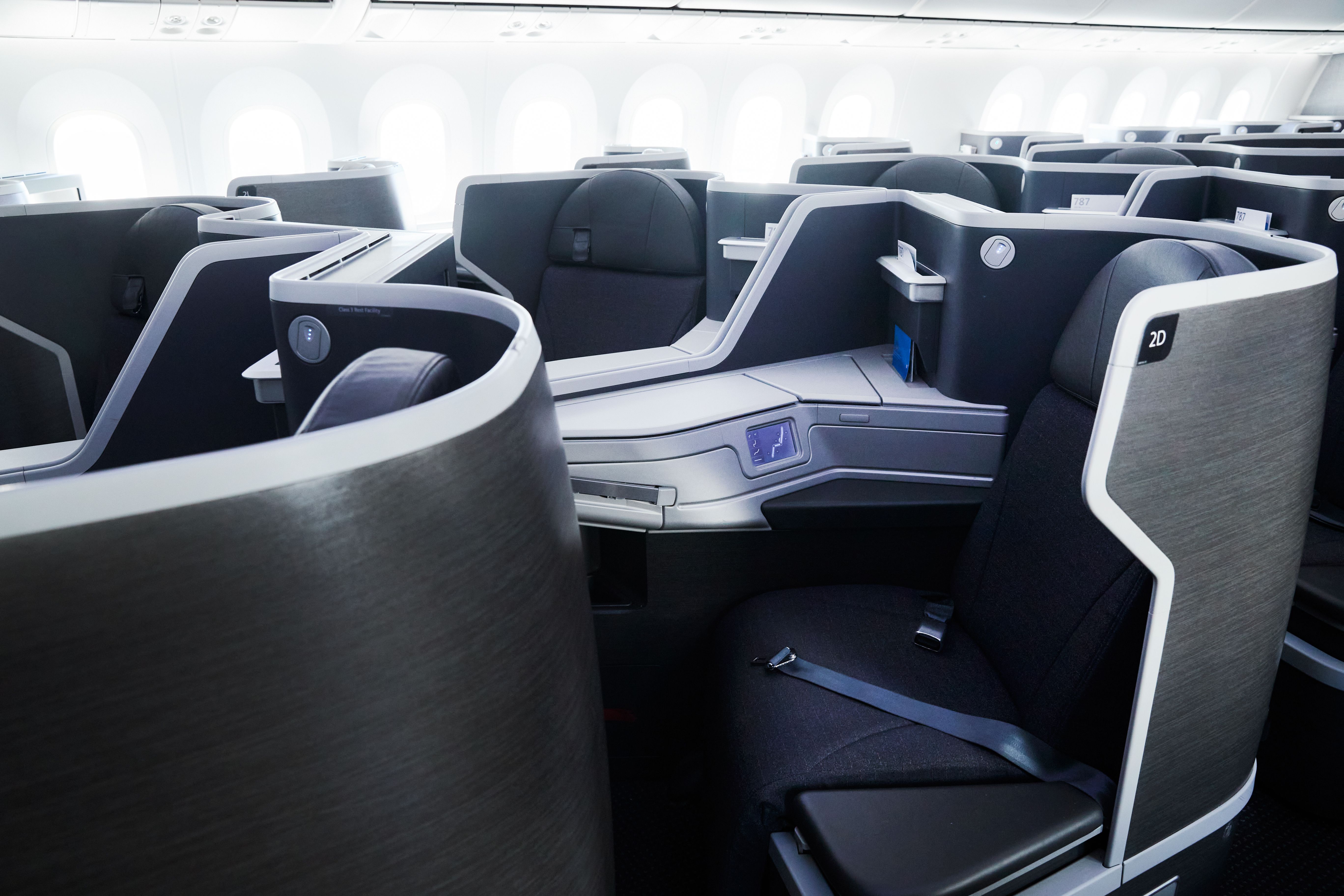 Several Seats of an American Airlines widebody aircraft Flagship Business cabin.