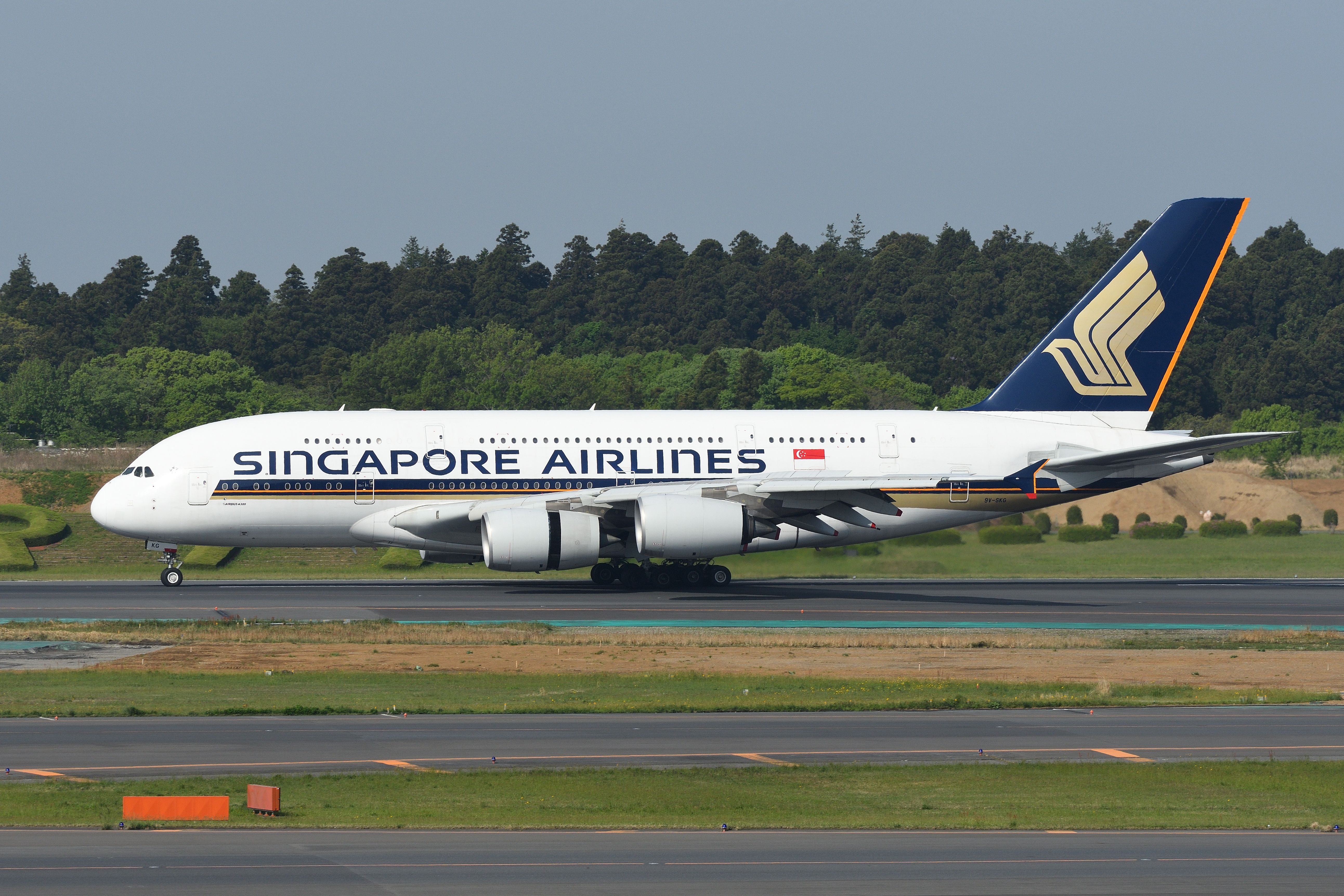 A Singapore Airlines Airbus A380 on an airport apron.