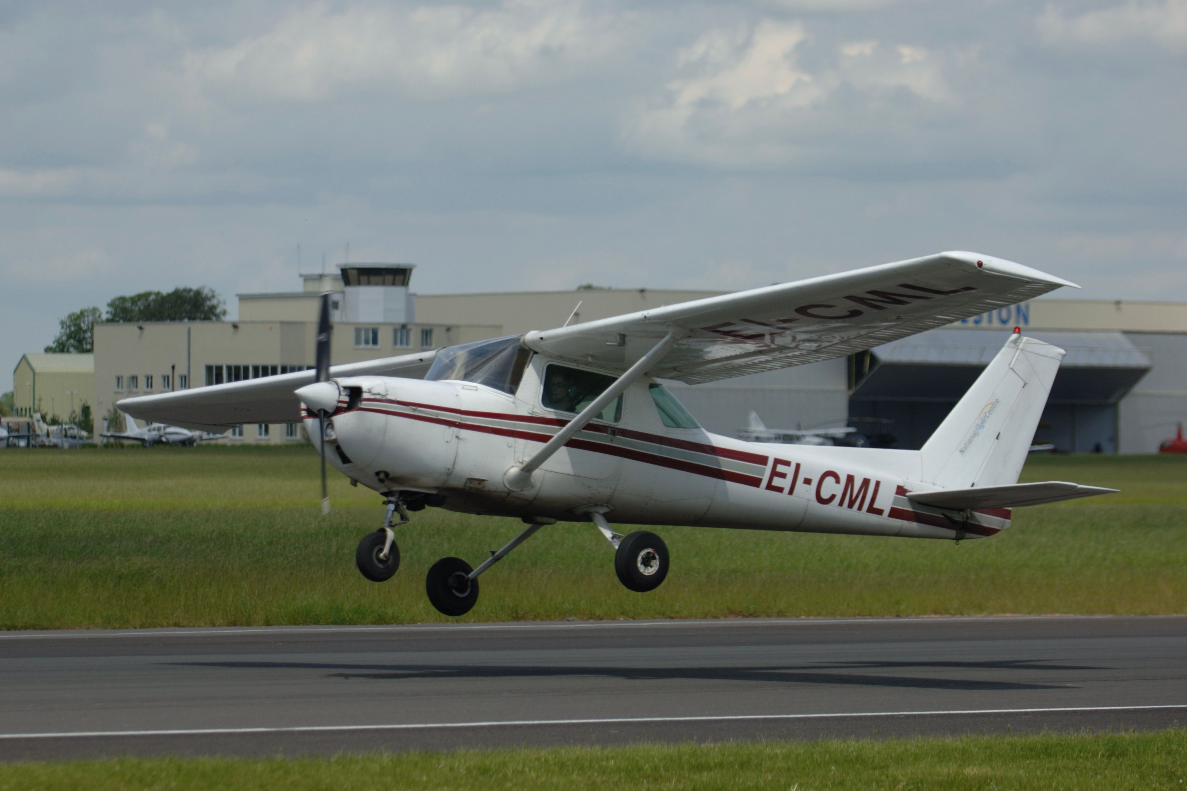 A Cessna 152 about to land.
