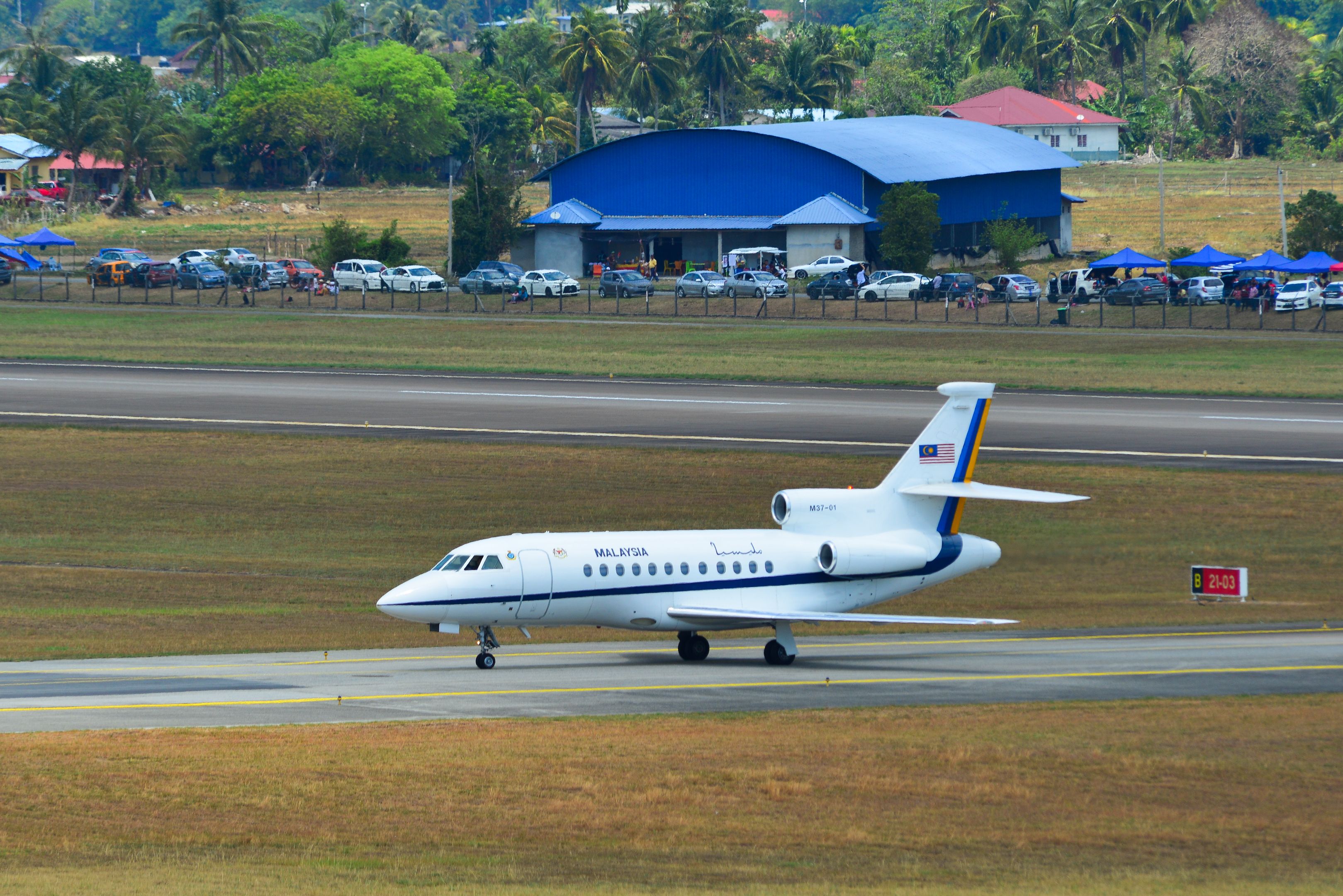 A Royal Malaysian Air Force Dassault Falcon 900 on an airport apron.