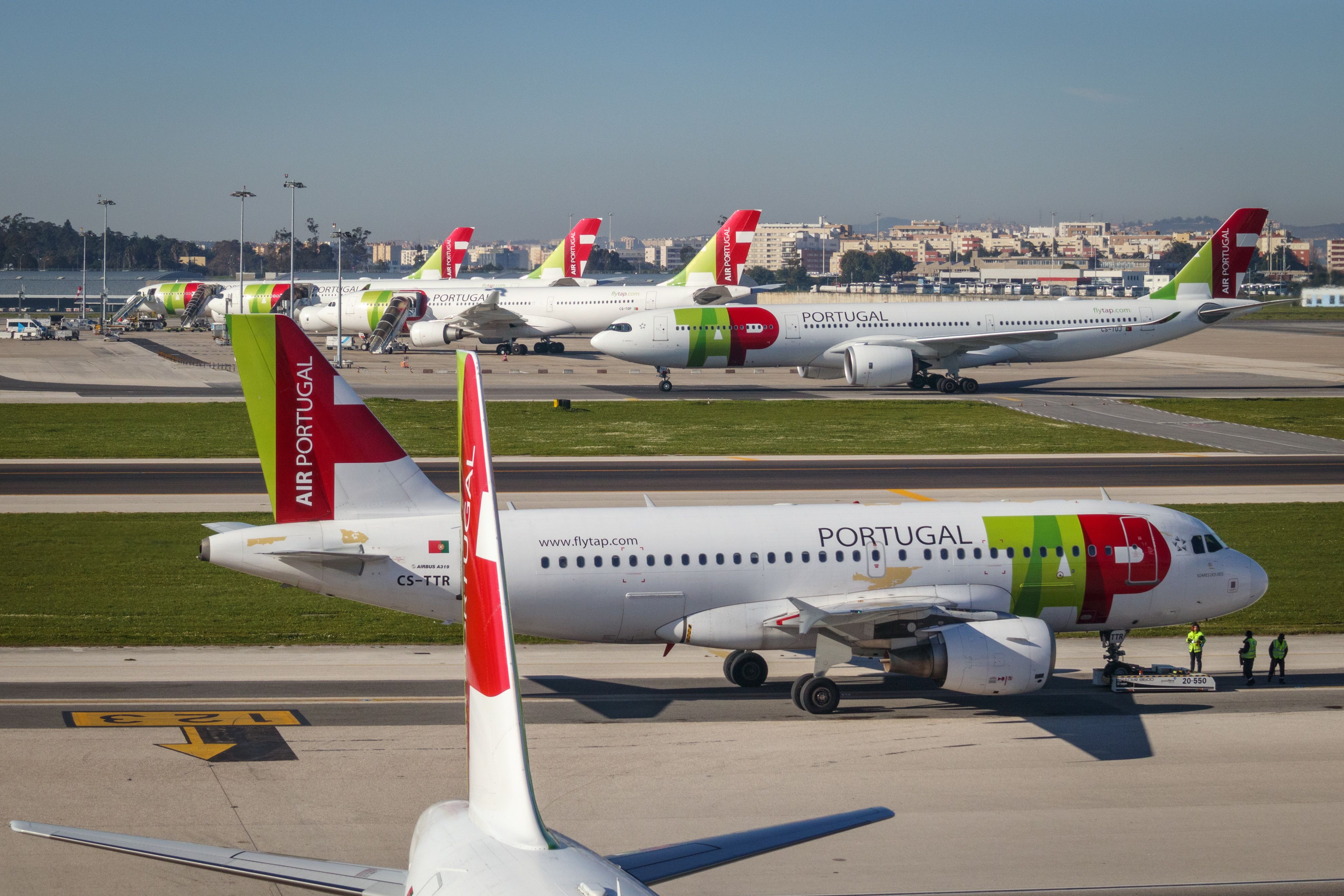 TAP Air Portugal planes prepare for takeoff at Humberto Delgado Airport. Transportes Aéreos Portugueses joined the Star Alliance since 2005.