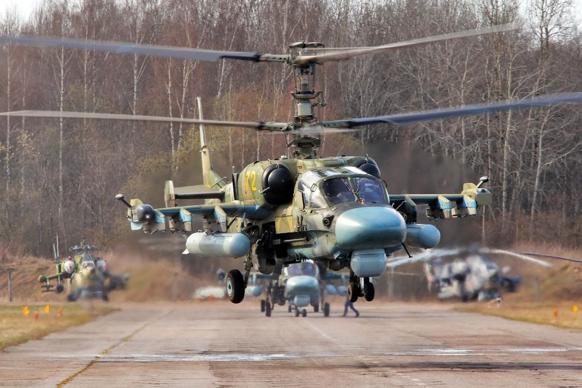 A Kamov Ka-52 Russian Air Force attack helicopter on an airfield.