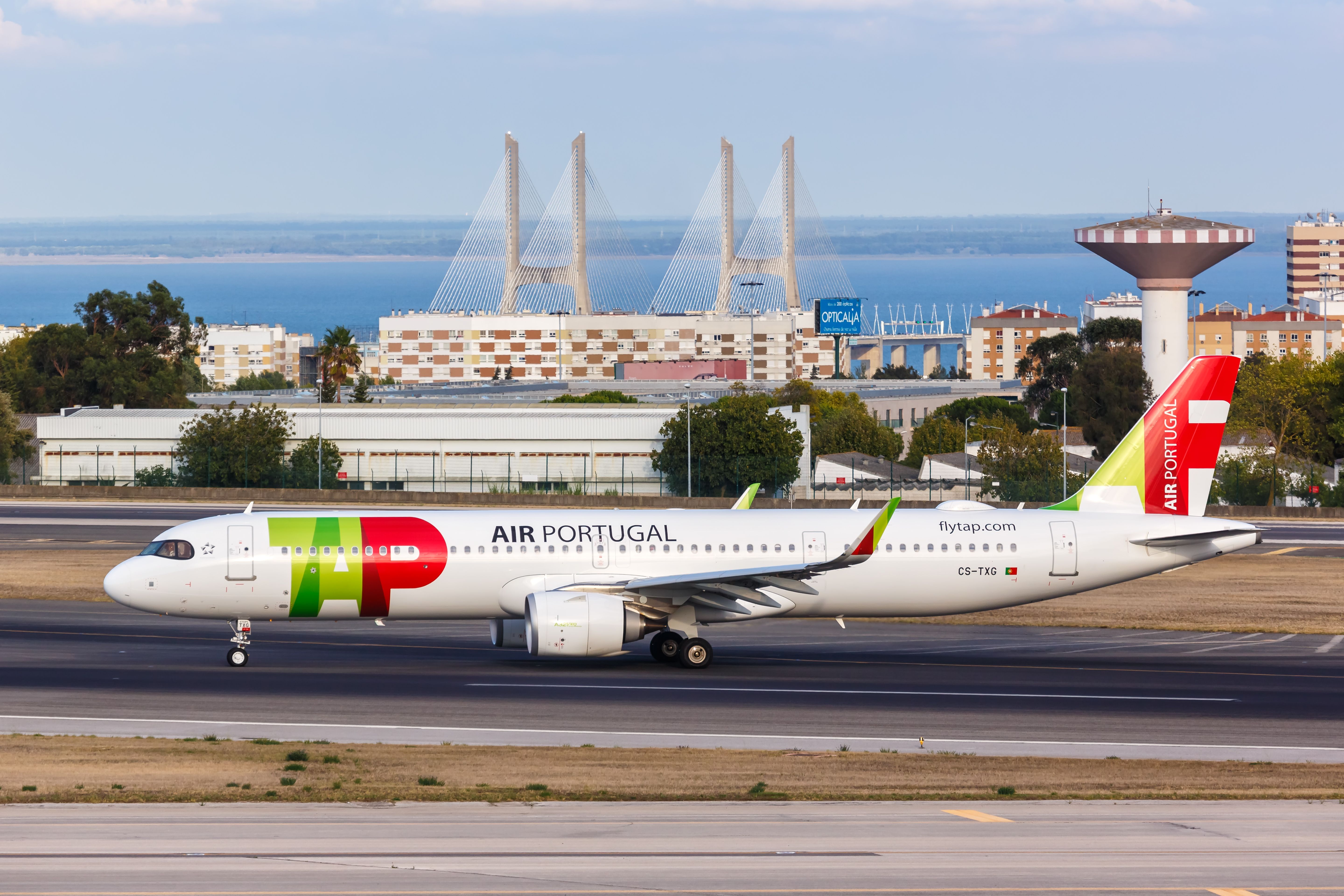 TAP Air Portugal Airbus A321neo airplane at Lisbon airport (LIS) in Portugal in front of the 