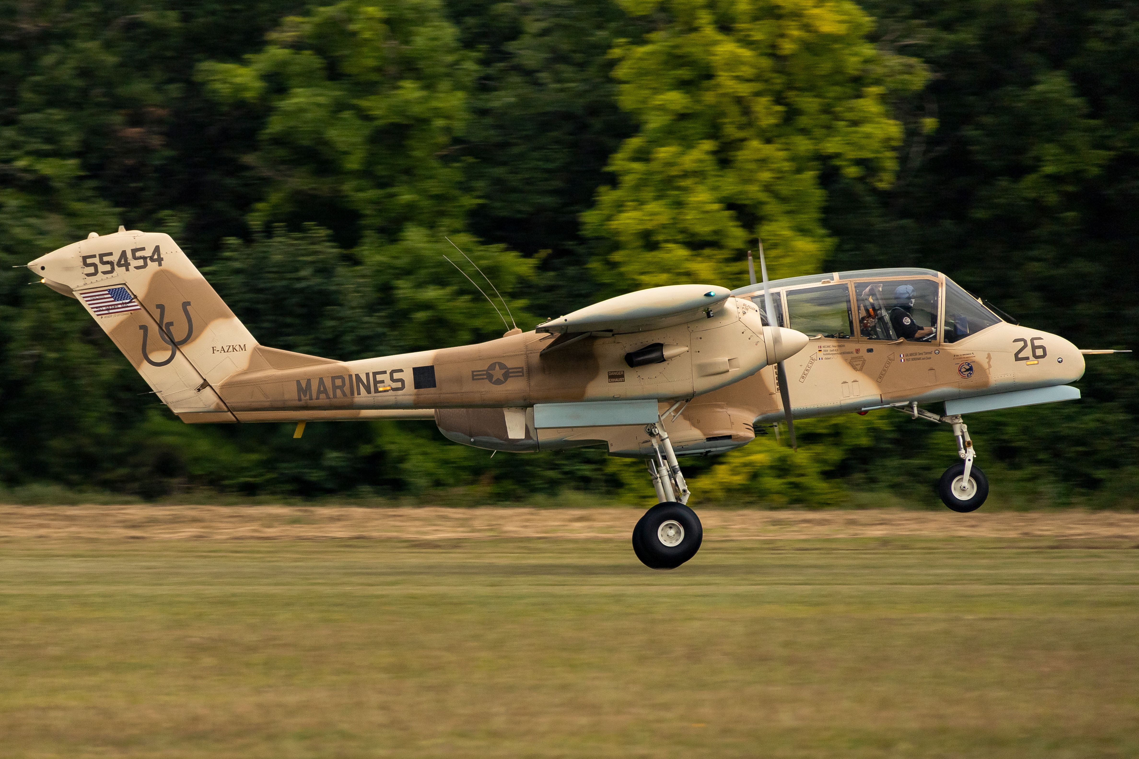 An OV-10 Bronco just after taking off.