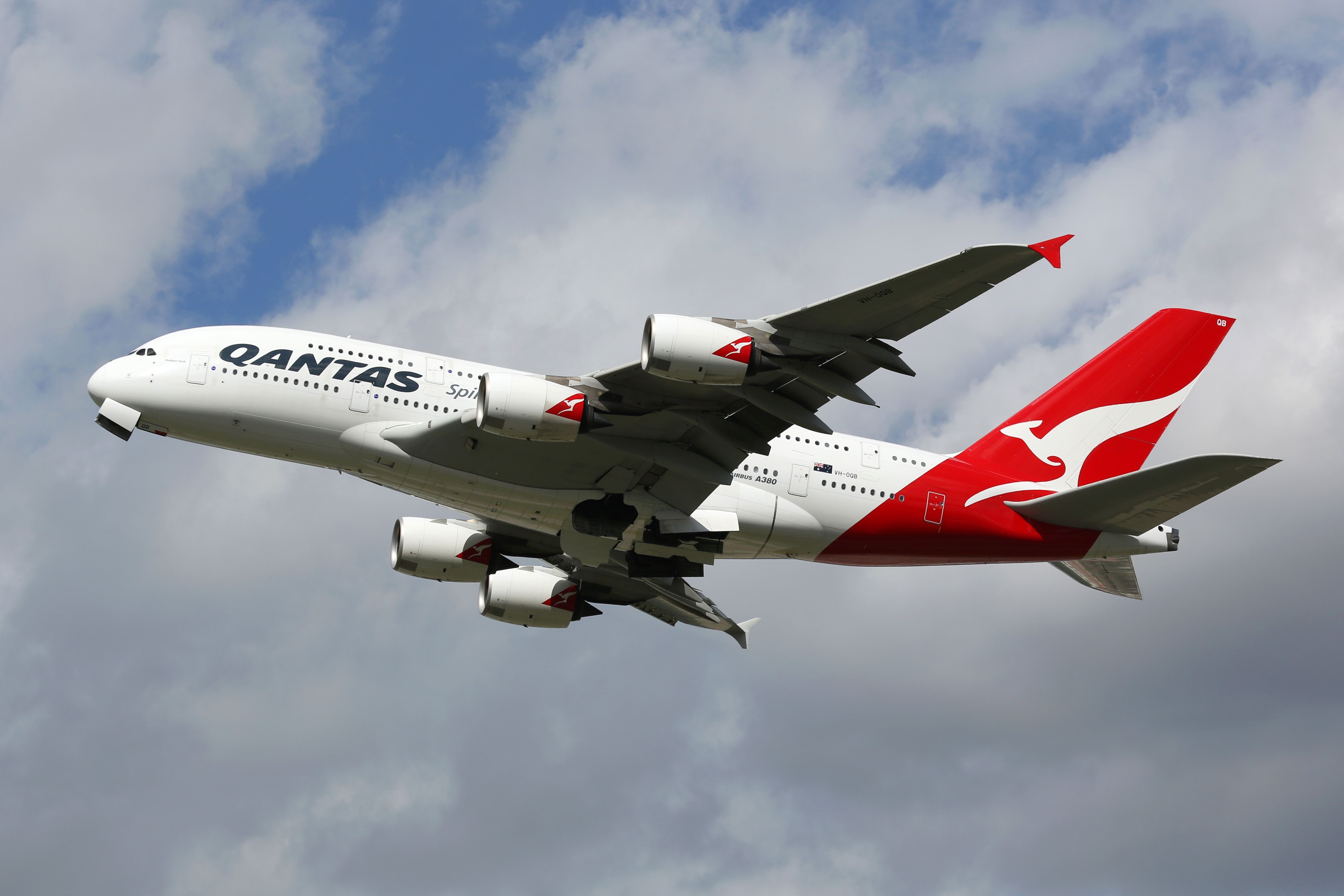 A Qantas Airbus A380 flying in the sky.