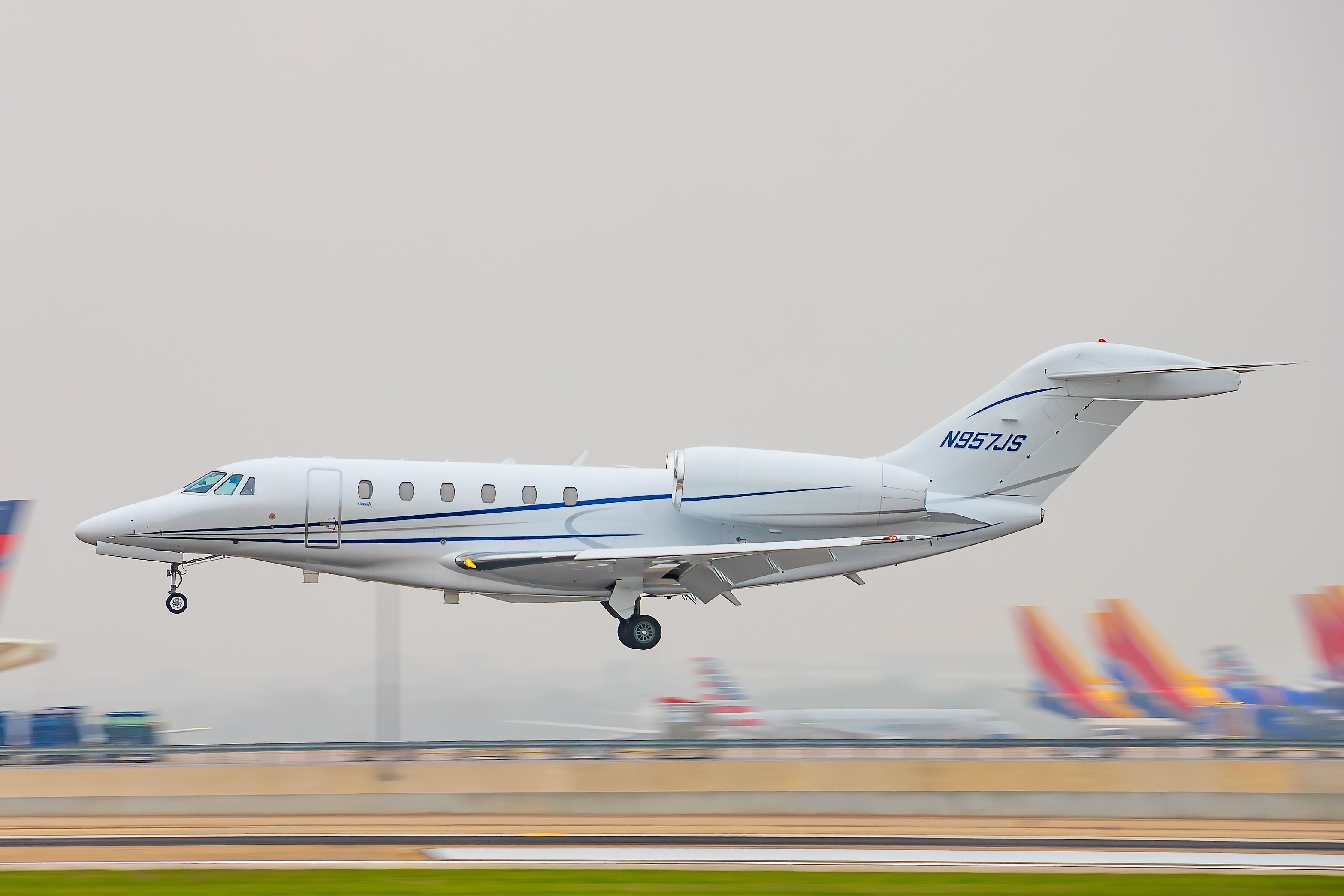 A FlyExclusive Cessna 750 Citation X about to land at Austin-Bergstrom International Airport.