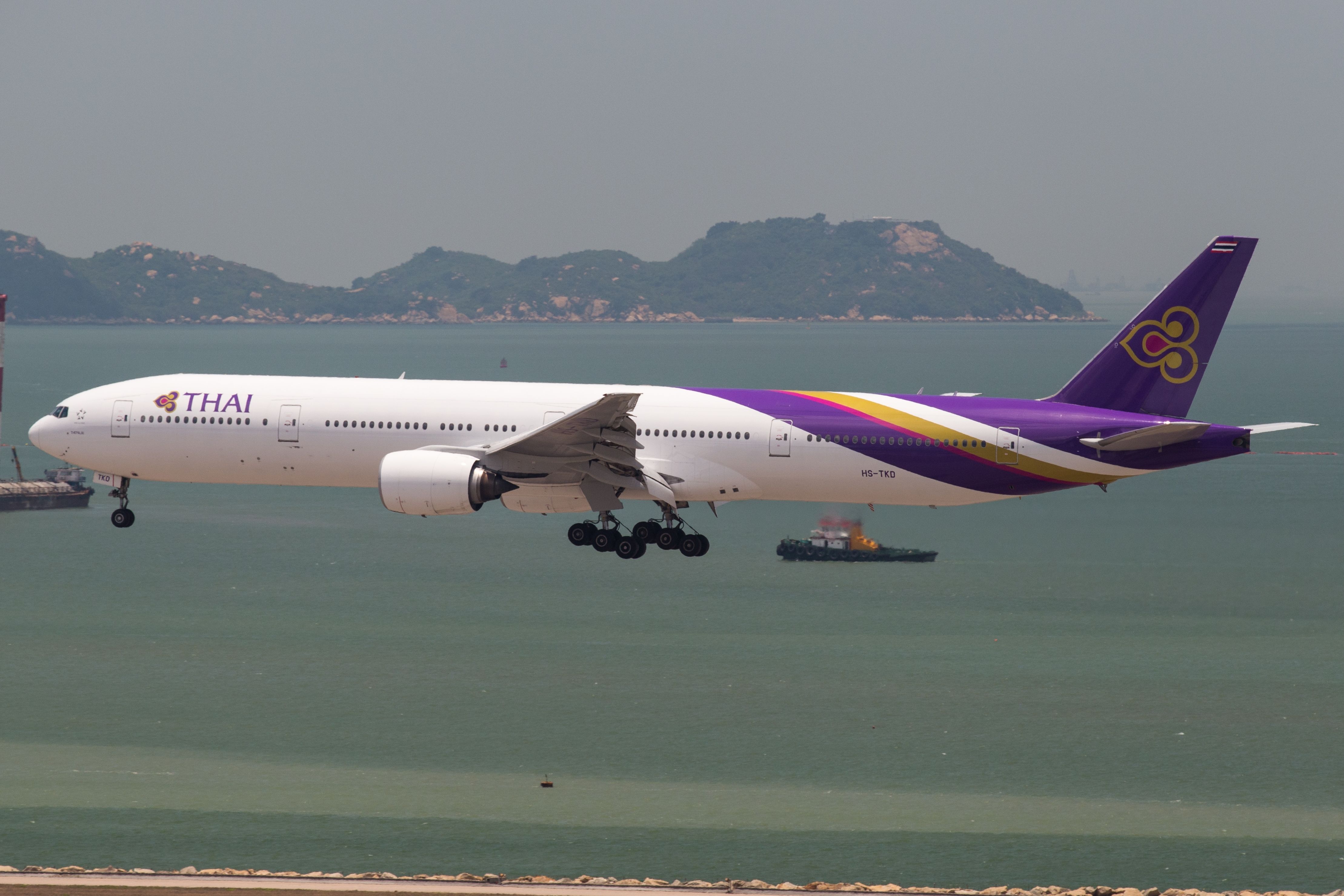A Thai Airways Boeing 777 landing at HKG airport