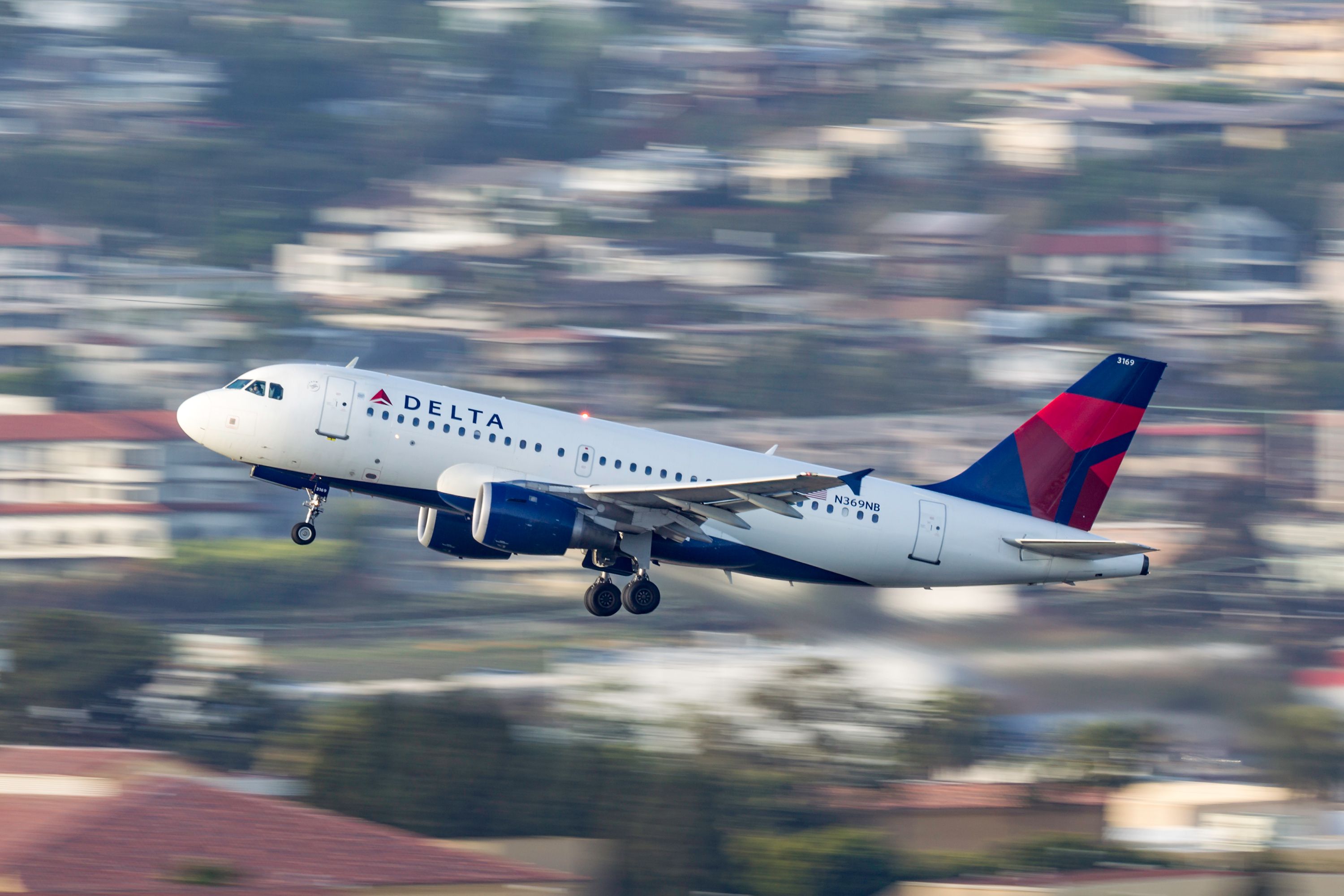 Delta Air Lines Airbus A319-112 N369NB taking off from San Diego International Airport.