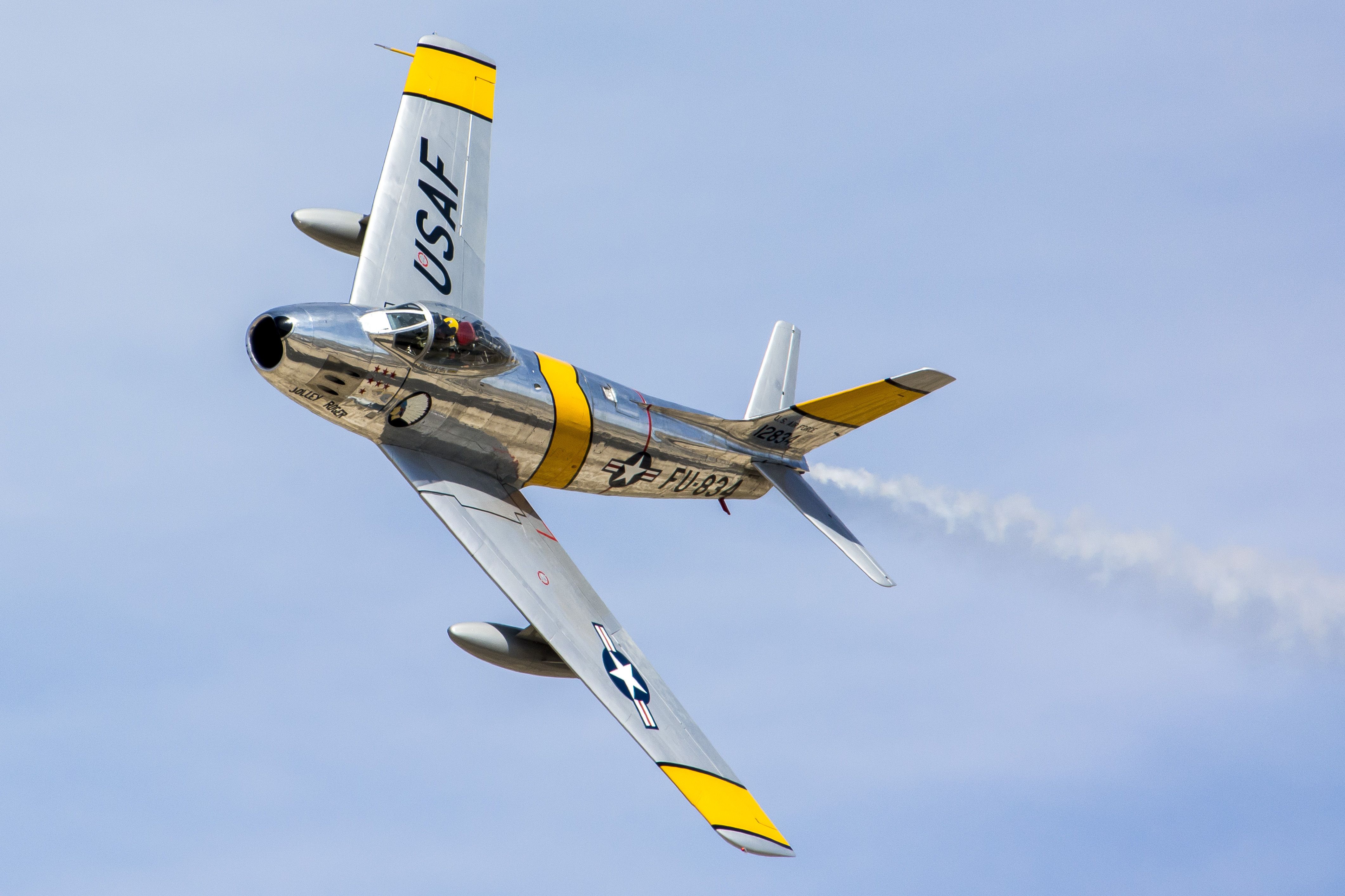 An F-86 flying in the sky.
