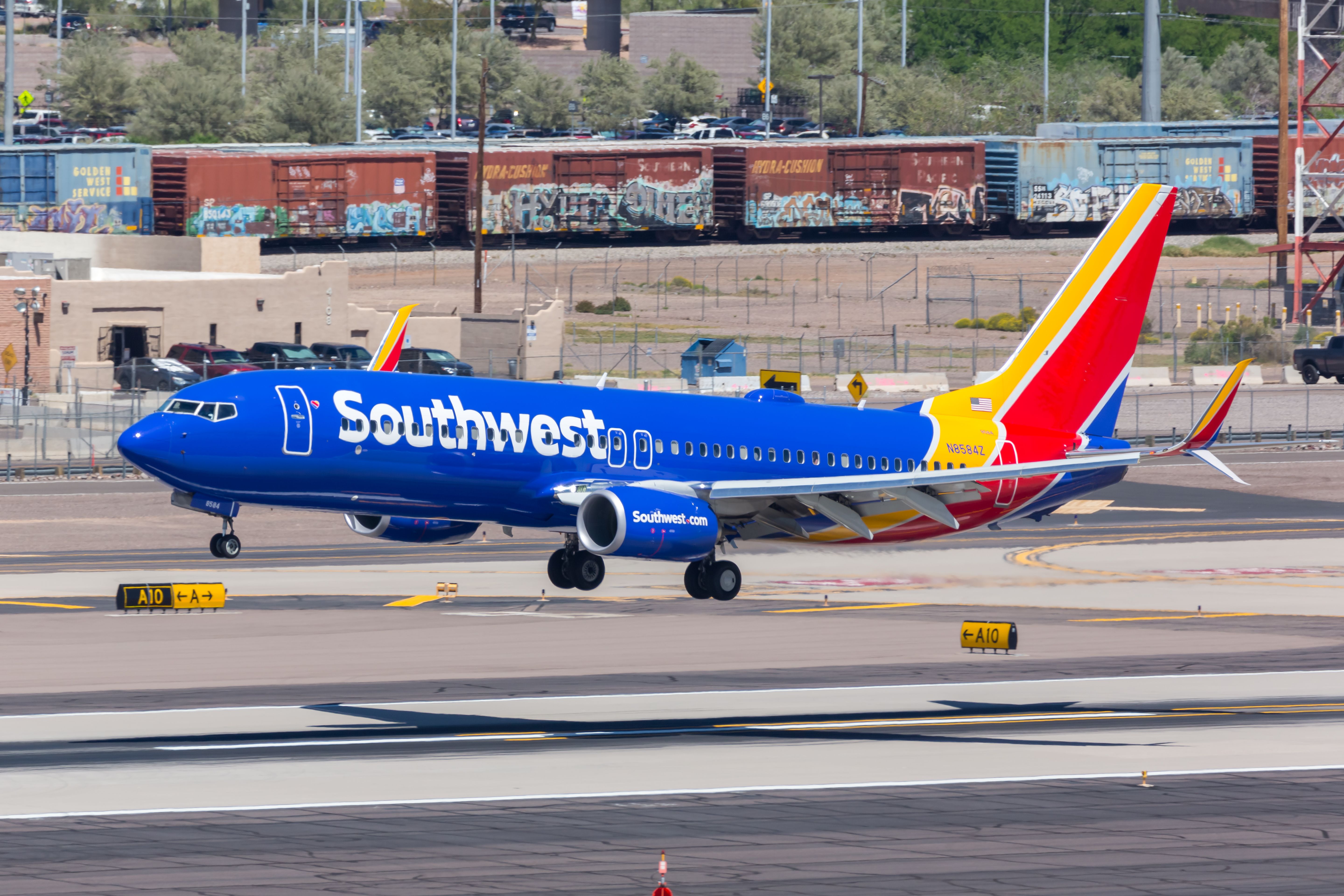Southwest Airlines Boeing 737-800 landing at Pheonix Skyharbor International Airport PHX shutterstock_1474838726
