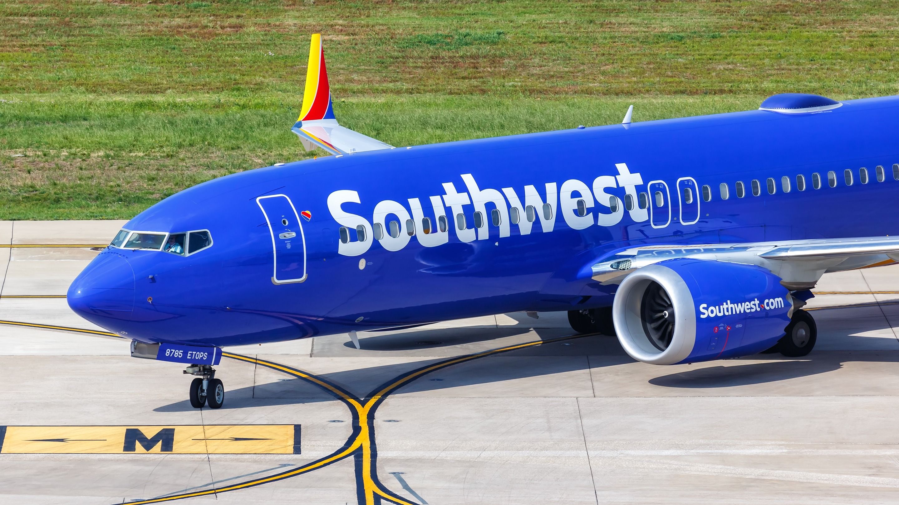 Southwest Airlines Boeing 737 MAX taxiing to the gate shutterstock_2334328221