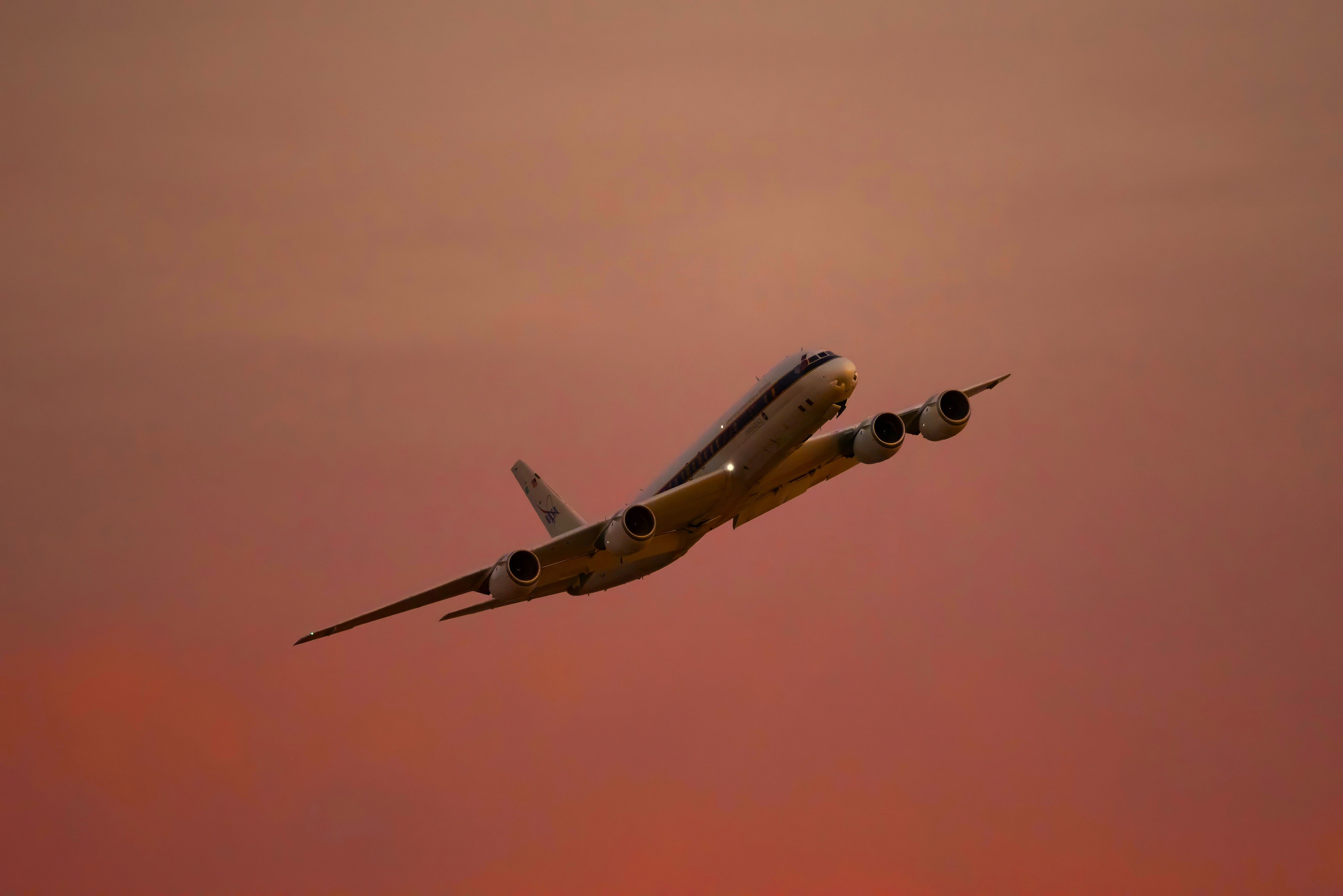 Topaz-AFRC2021-0003-14 v2 - NASA DC-8 lifts off from Air Force Plant 42 in Palmdale, Calif., at sunset.