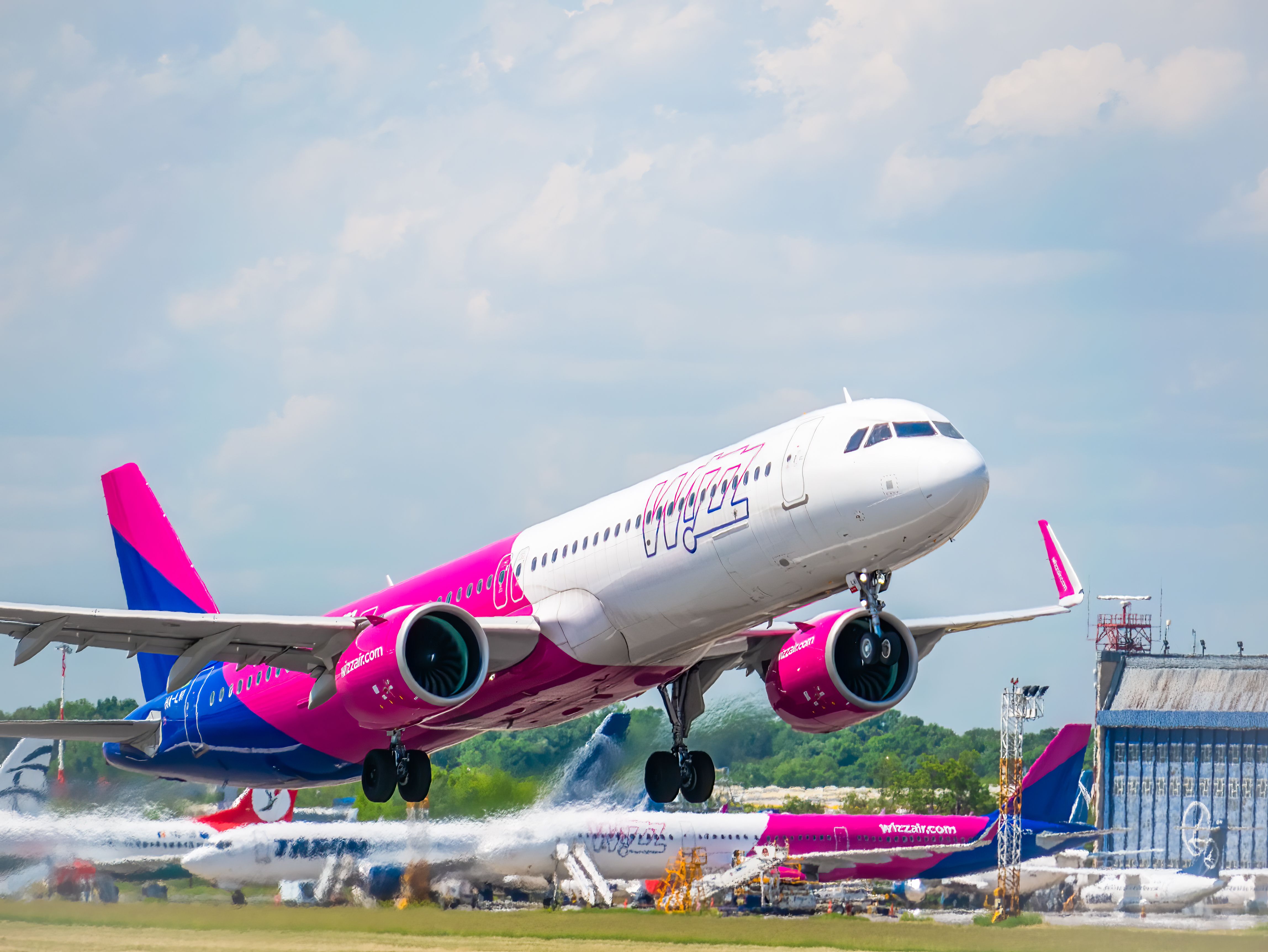 A Wizz Air A320 taking off.