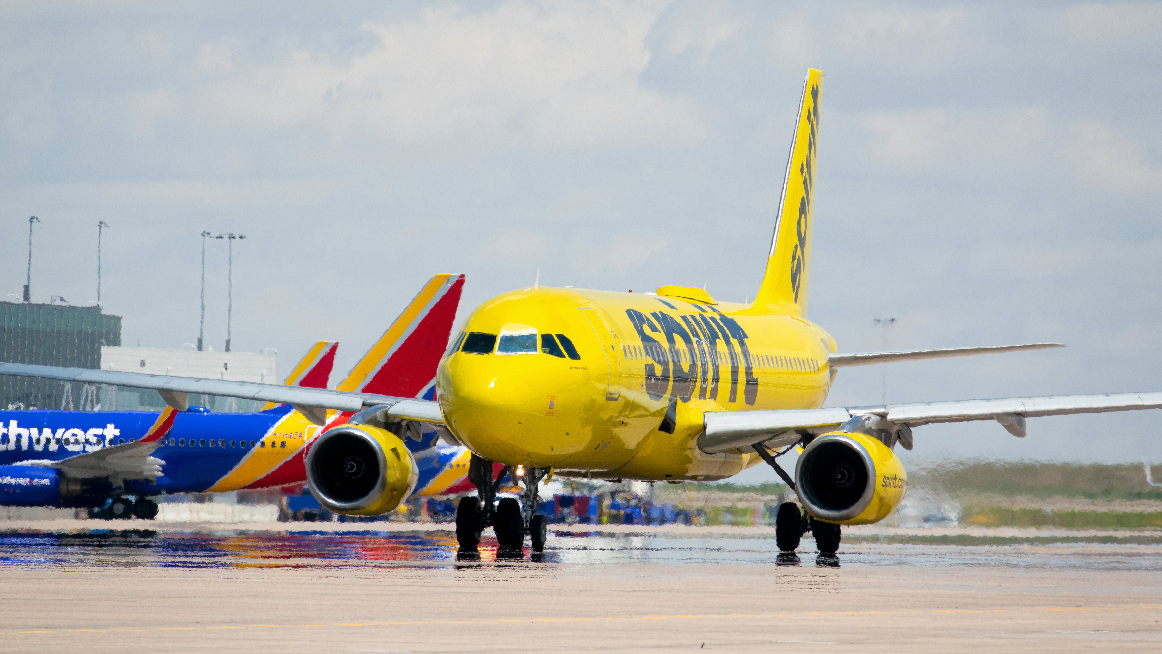 Spirit Airlines and Southwest Airlines planes at Denver Airport