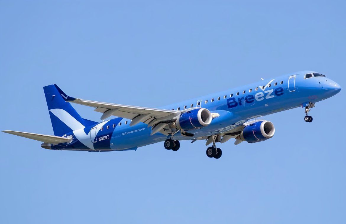 Breeze Airways Embraer E190 taking off from Raleigh-Durham International Airport.