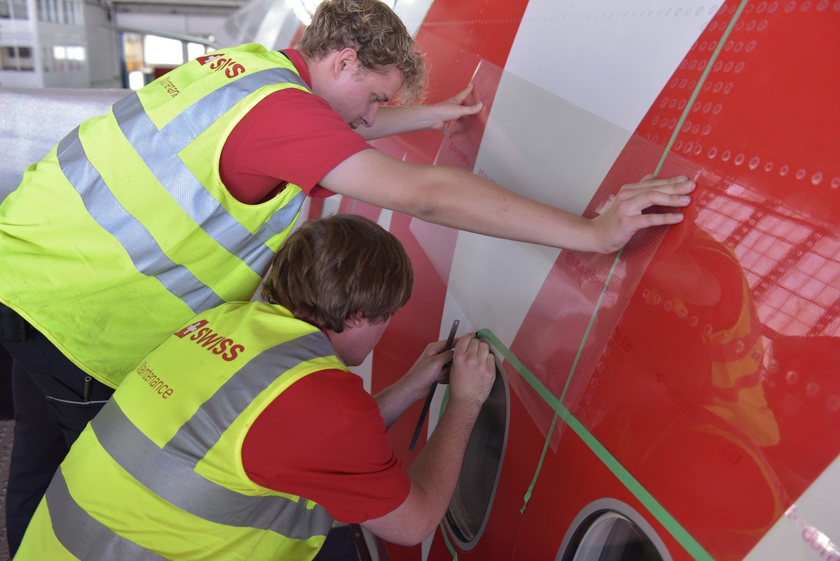 SWISS 777 being retrofitted with AeroSHARK technology.