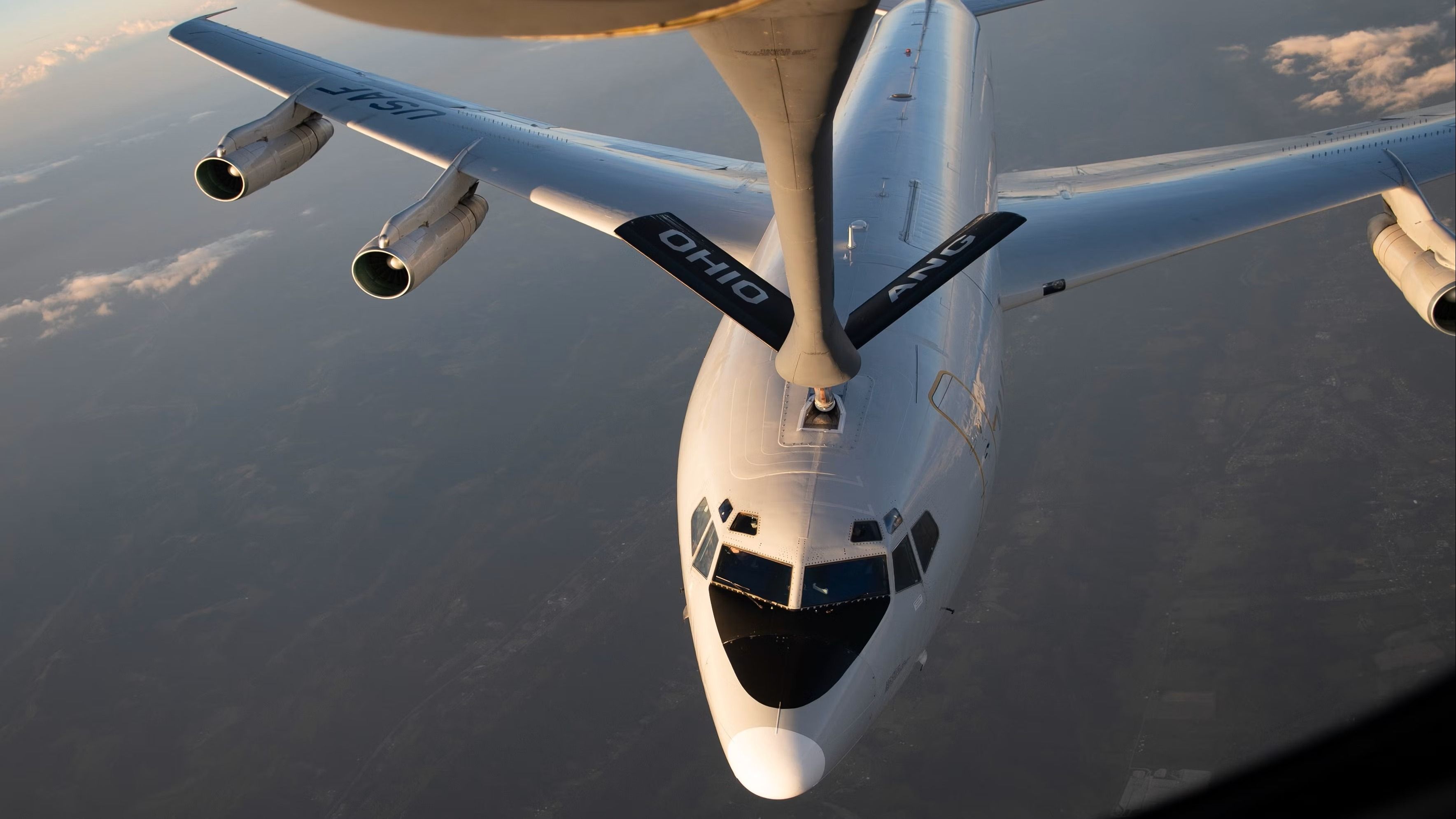 A KC-135 Stratotanker from the 121st Air Refueling Wing refuels an E-8C Joint Surveillance Target Attack Radar System with the 116th Air Control Wing over the skies of North Carolina