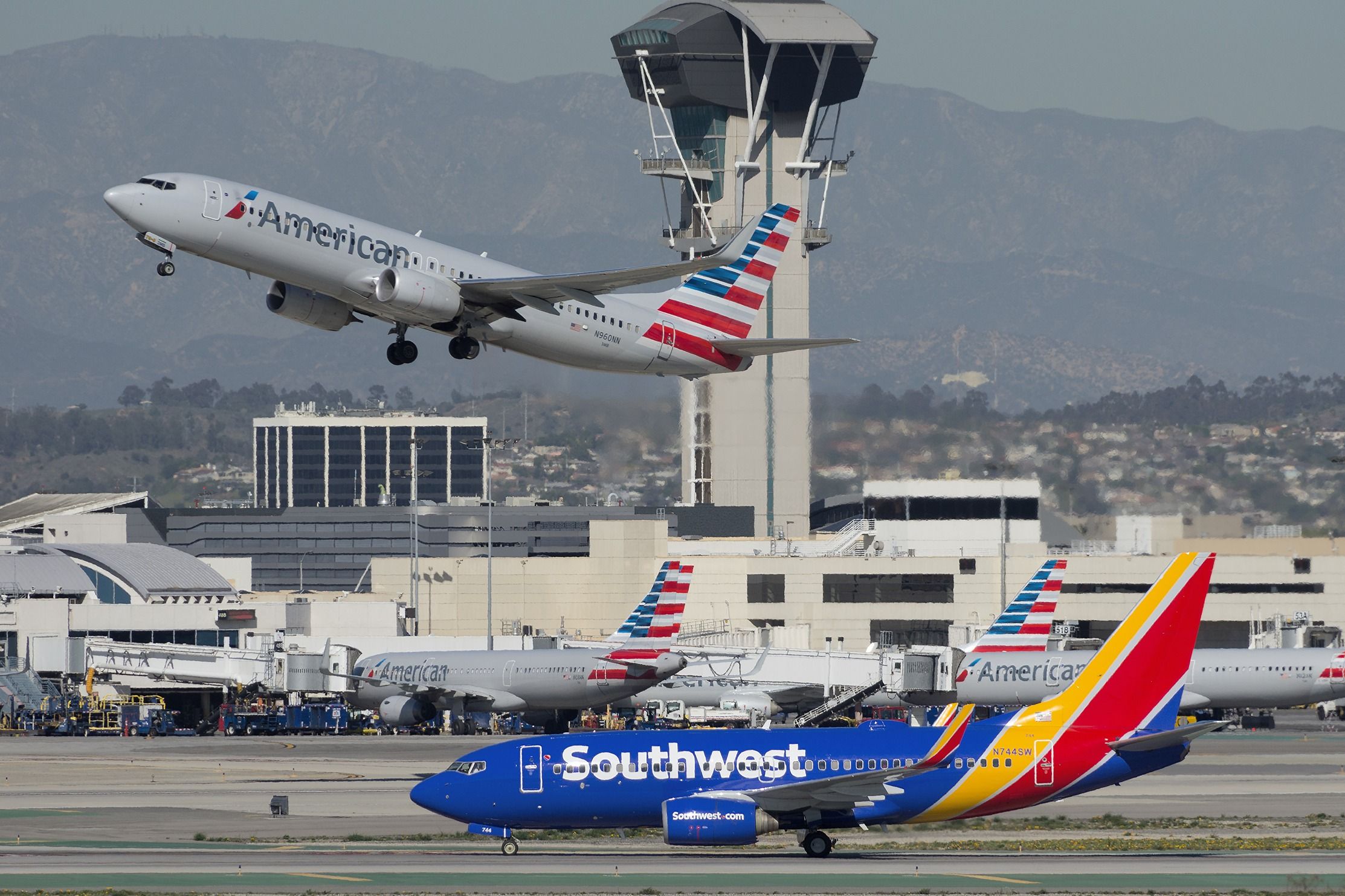 American Airlines and Southwest Airlines Boeing 737 aircraft at Los Angeles International Airport LAX shutterstock_498024874