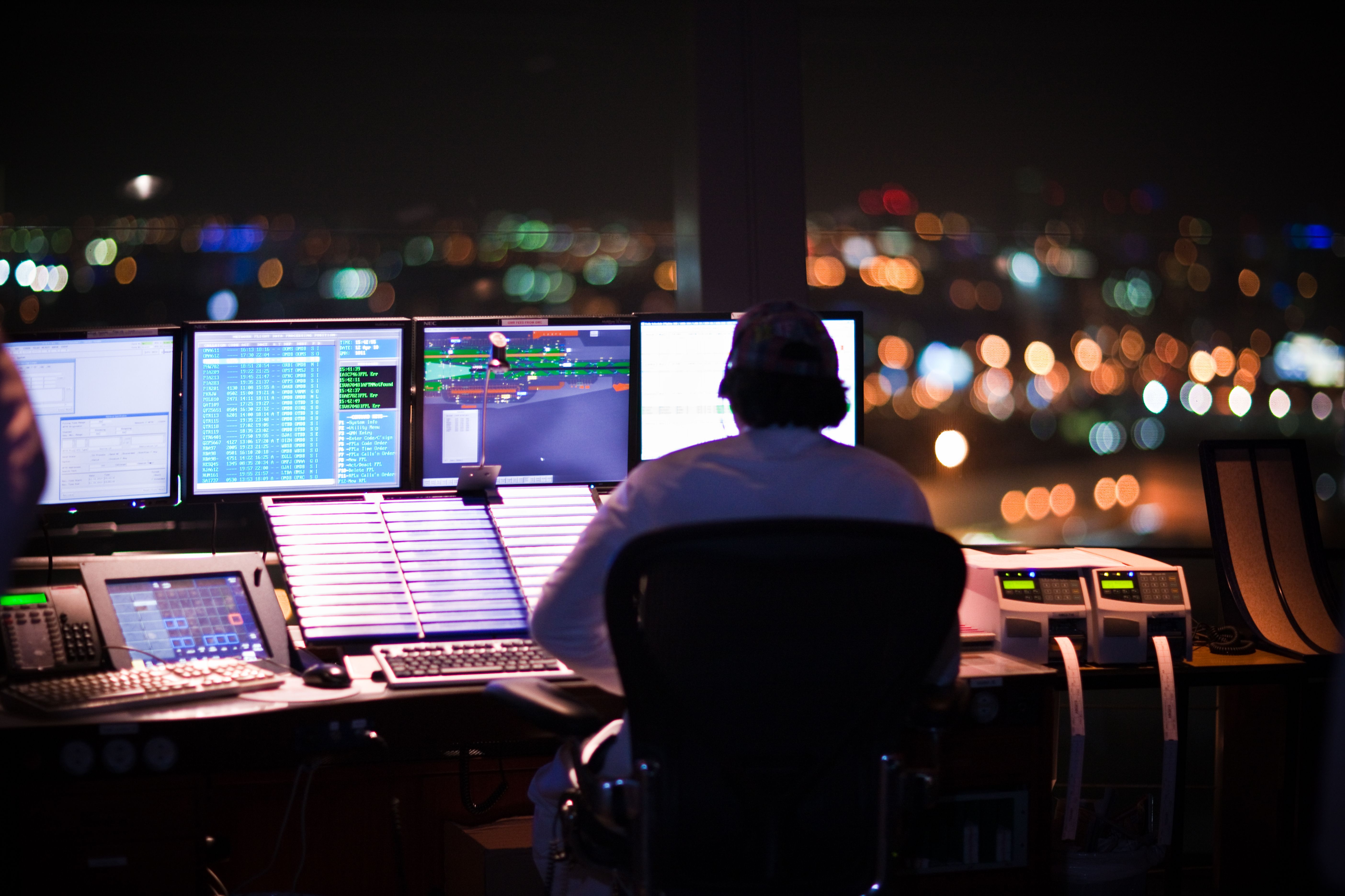 An air traffic controller working at night