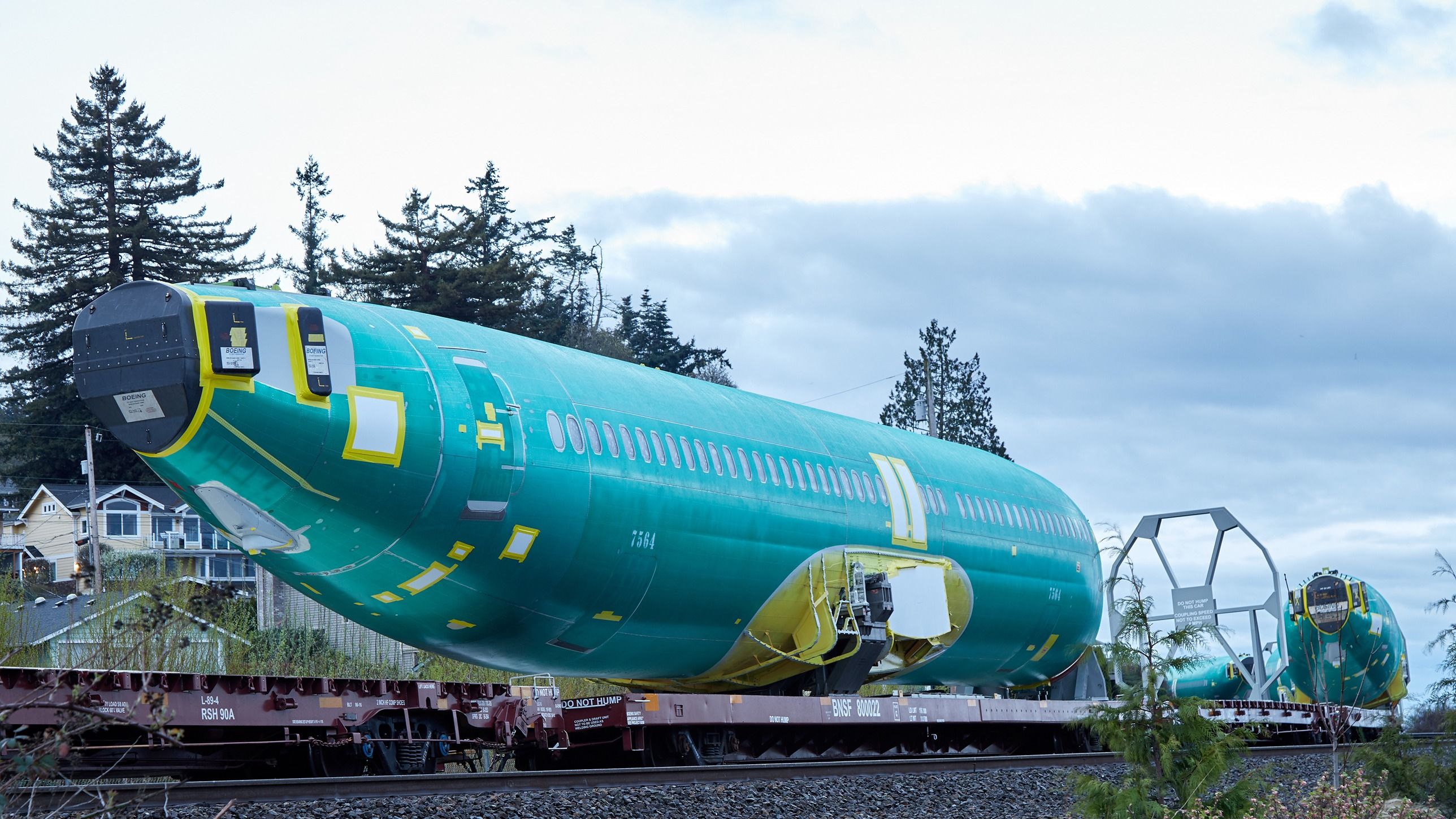 Boeing 737 fuselage on a train to Renton, Washington shutterstock_1360438619