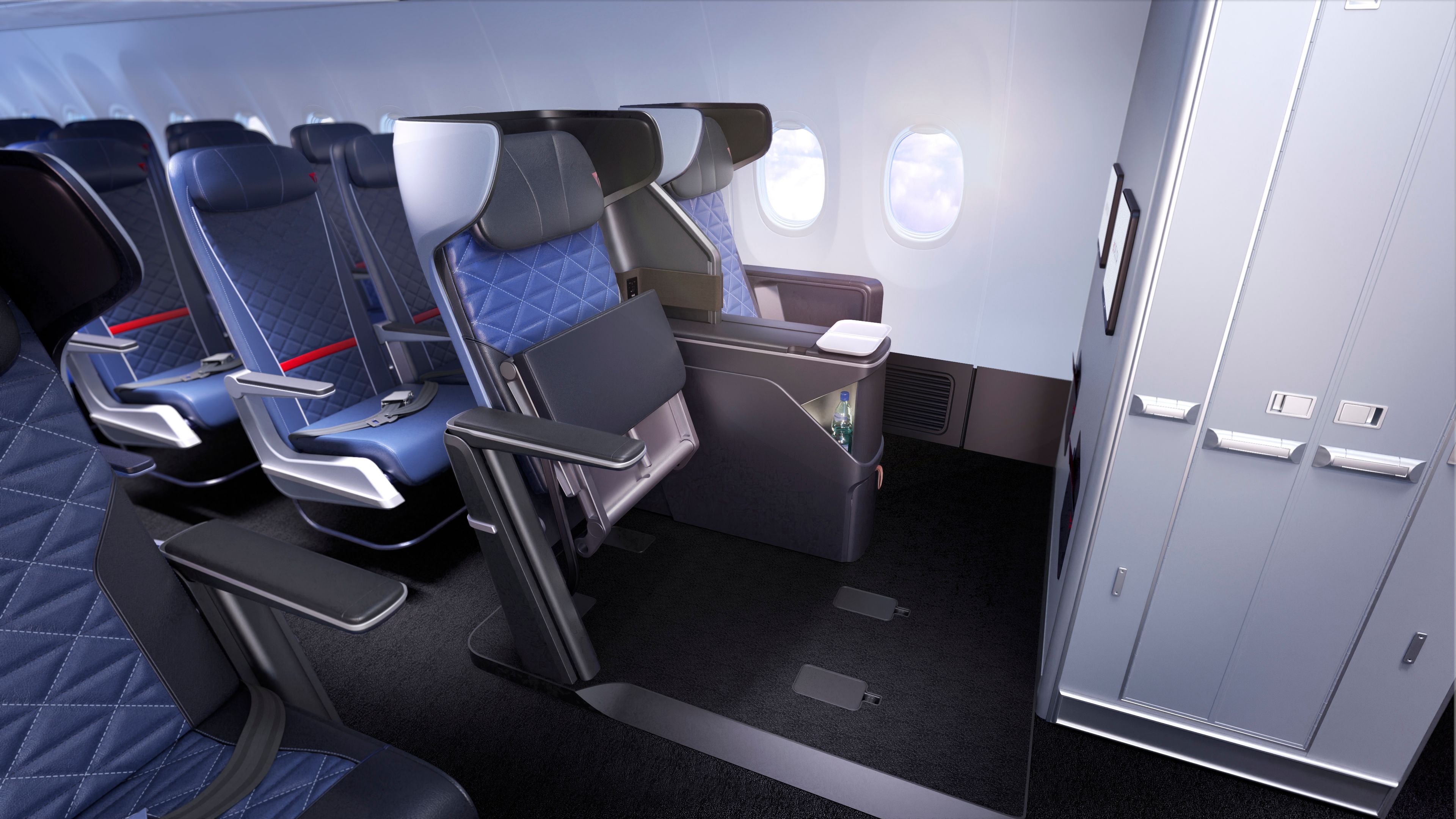 Below: Air for All / Delta Flight Product Business Class Seat with seat pan lifted.