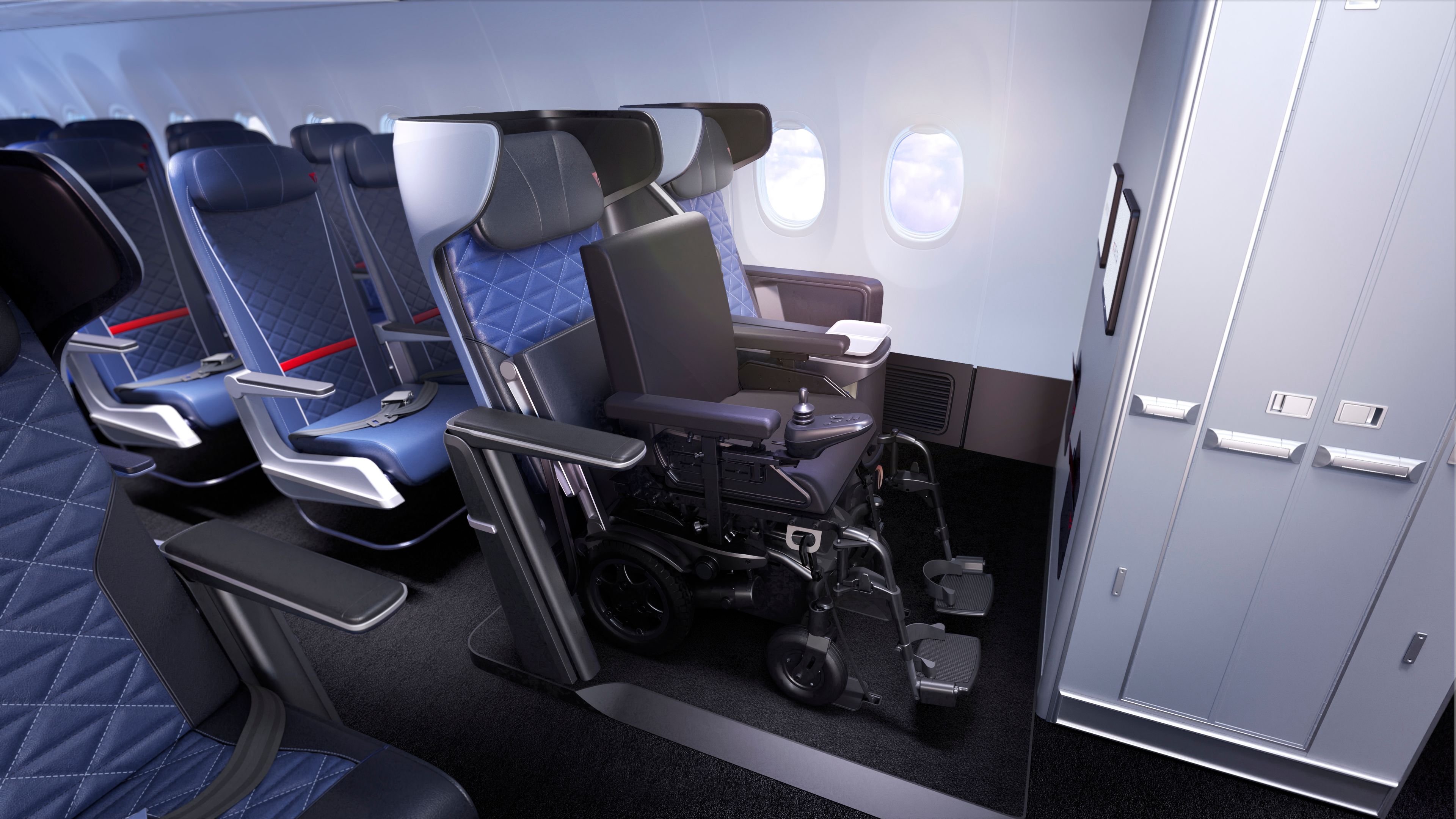 Below: Air for All / Delta Flight Product Business Class Seat with wheelchair secured and seat pan lifted.