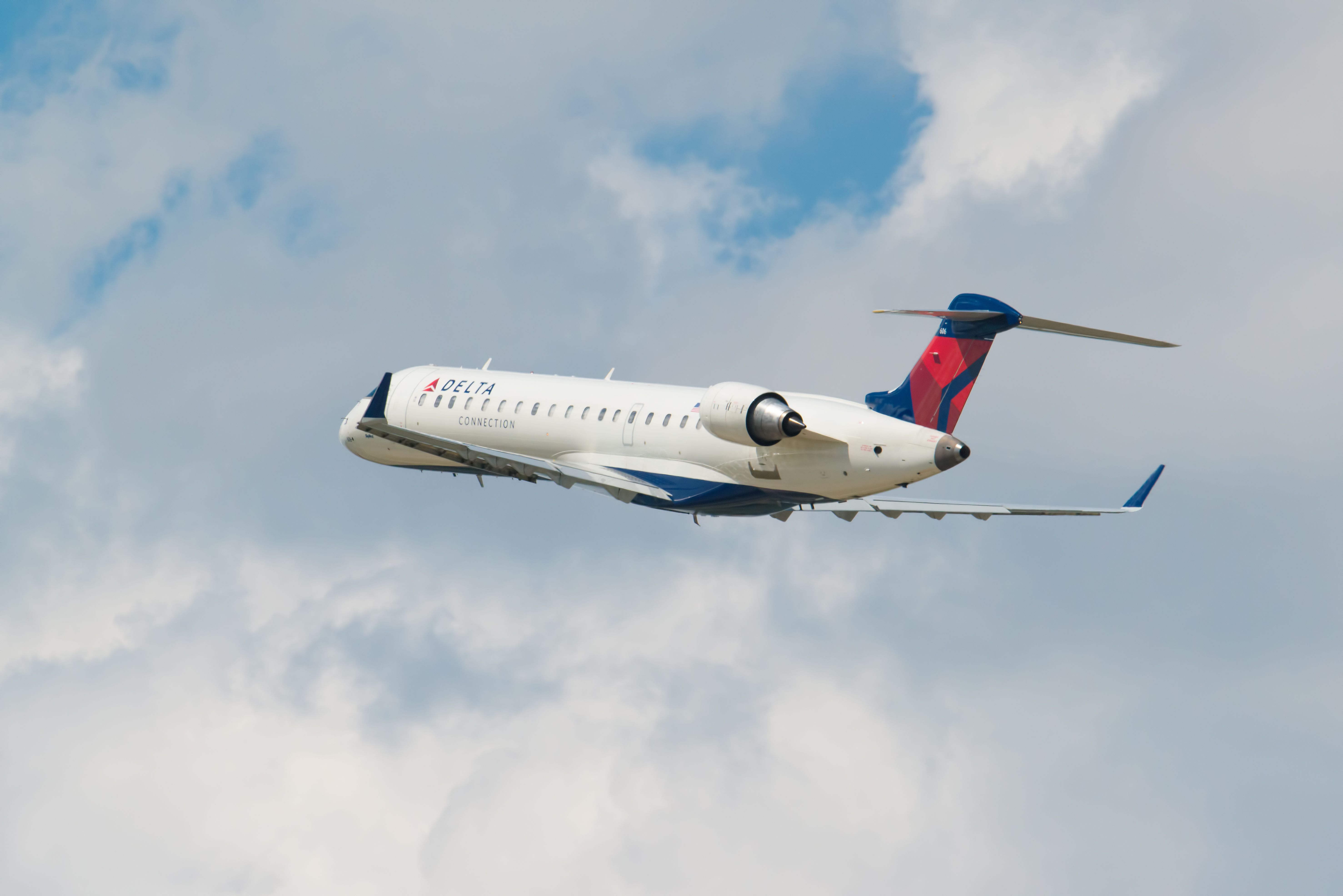 Delta Connection Bombardier CRJ700 taking off.