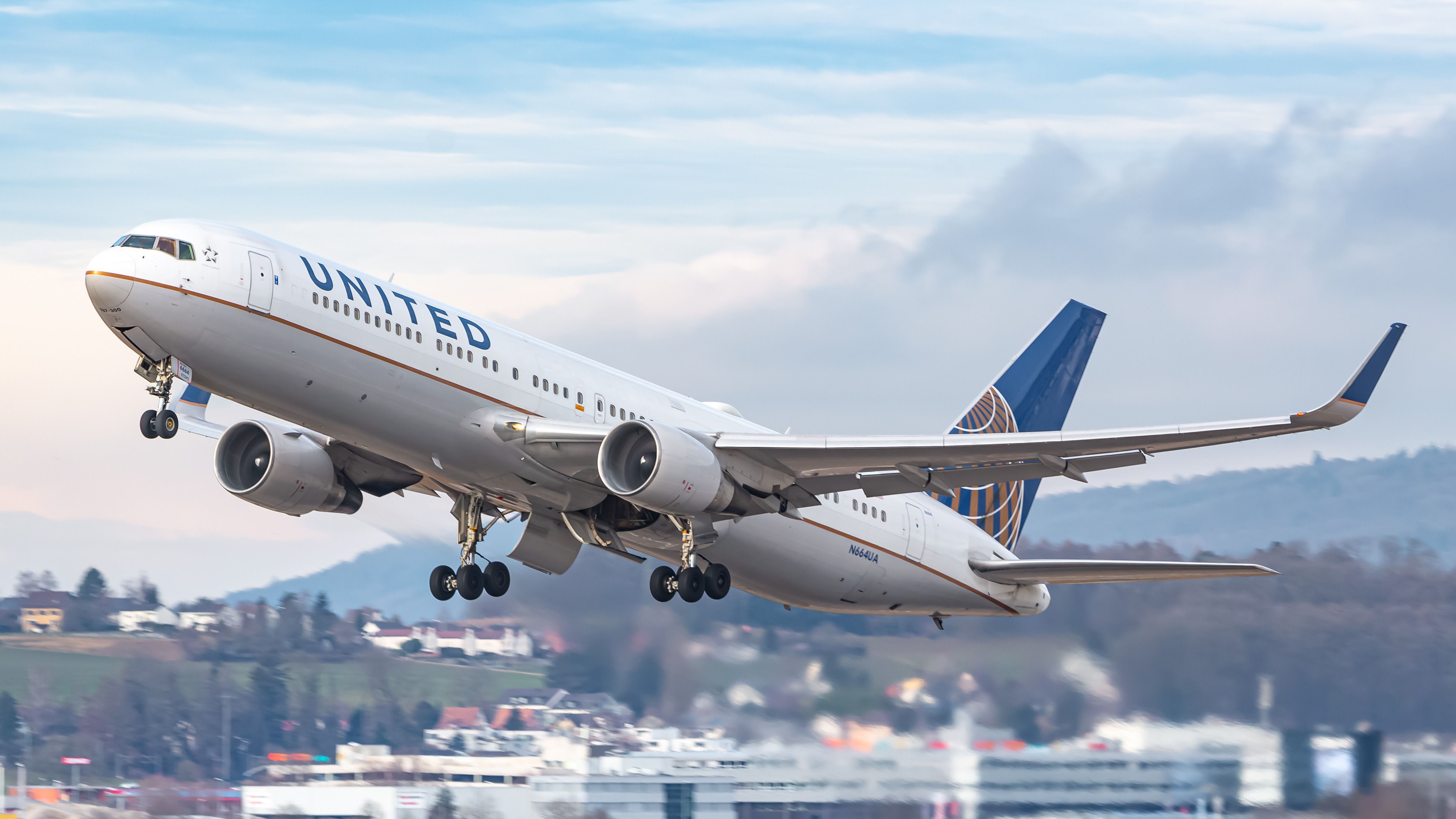 United Airlines Boeing 767-322/ER N664UA taking off.