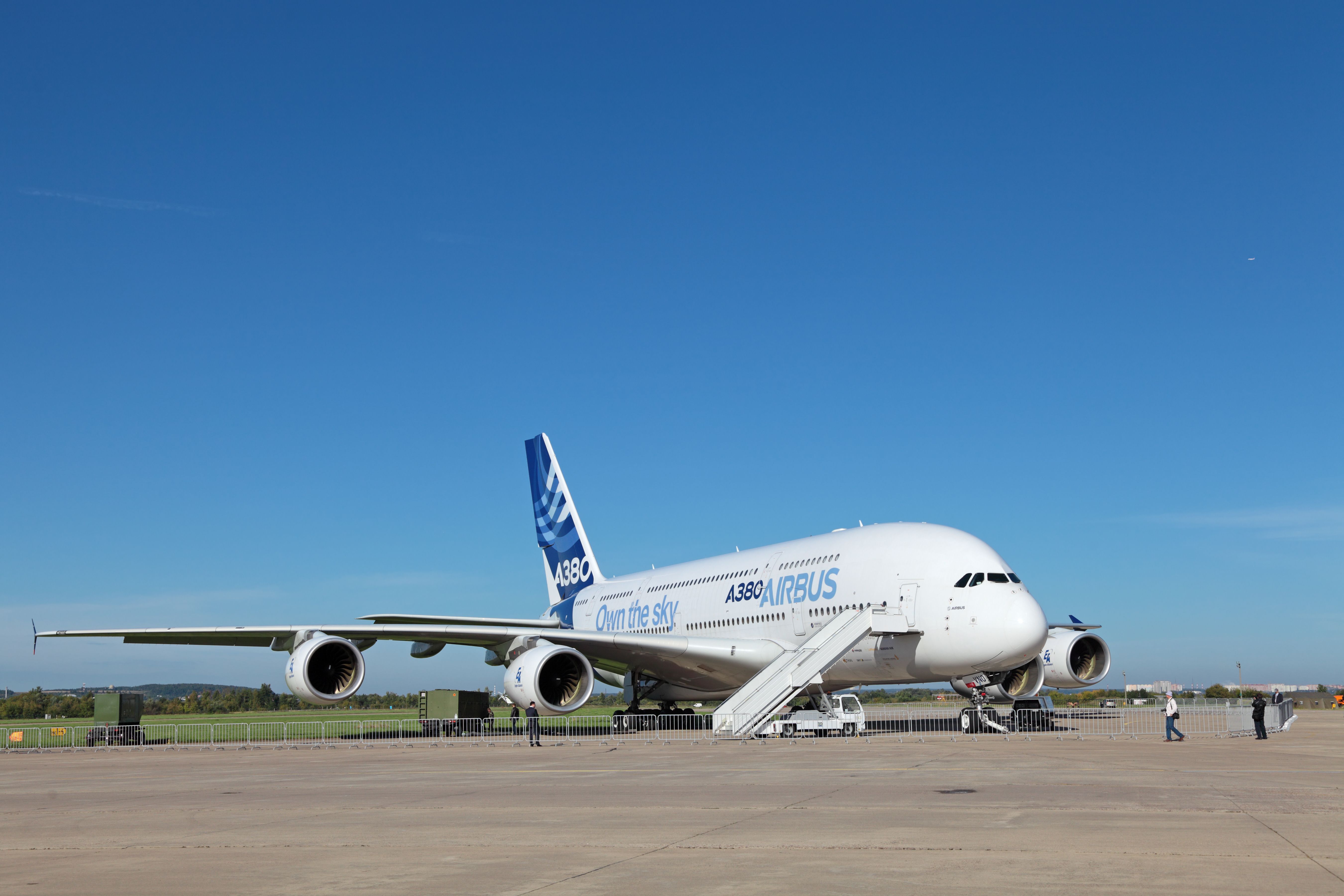 An Airbus A380 aircraft parked at an airport