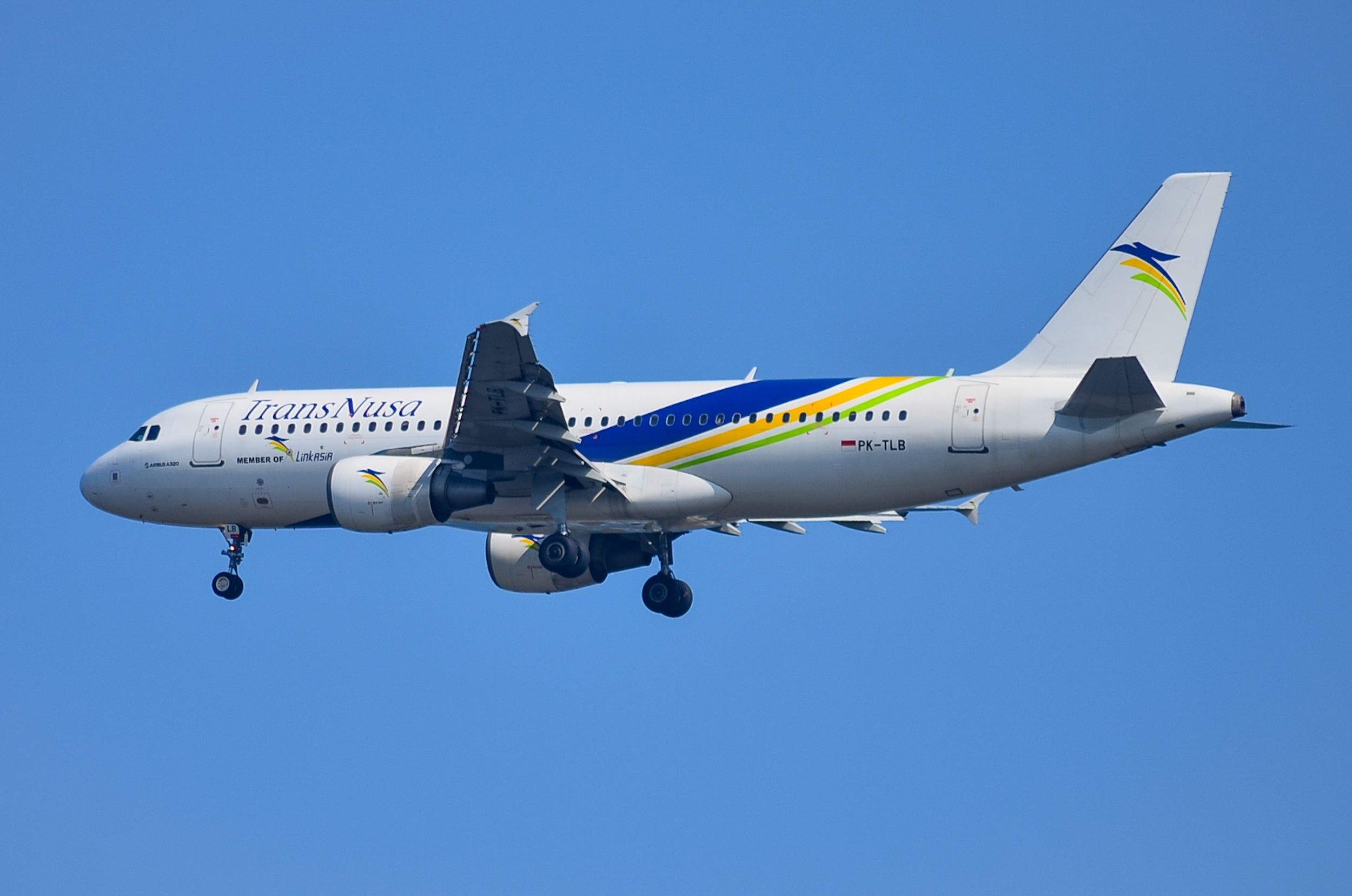 Kulon Progo, Indonesia - 21 June 2023: Transnusa's Airbus A320-214 aircraft from Jakarta is preparing to land in Yogyakarta Province