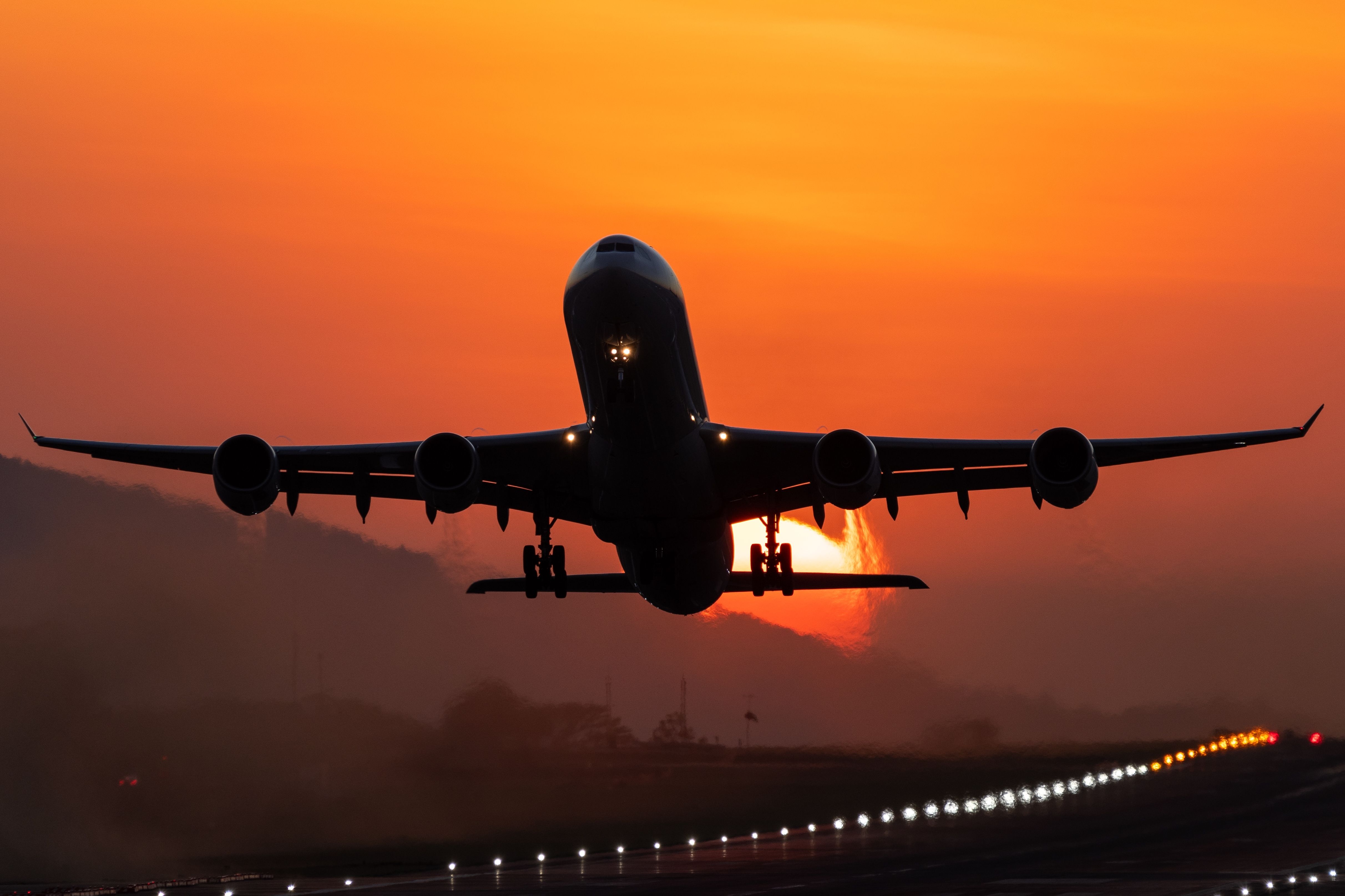 Airbus A340-600 departure at sunset