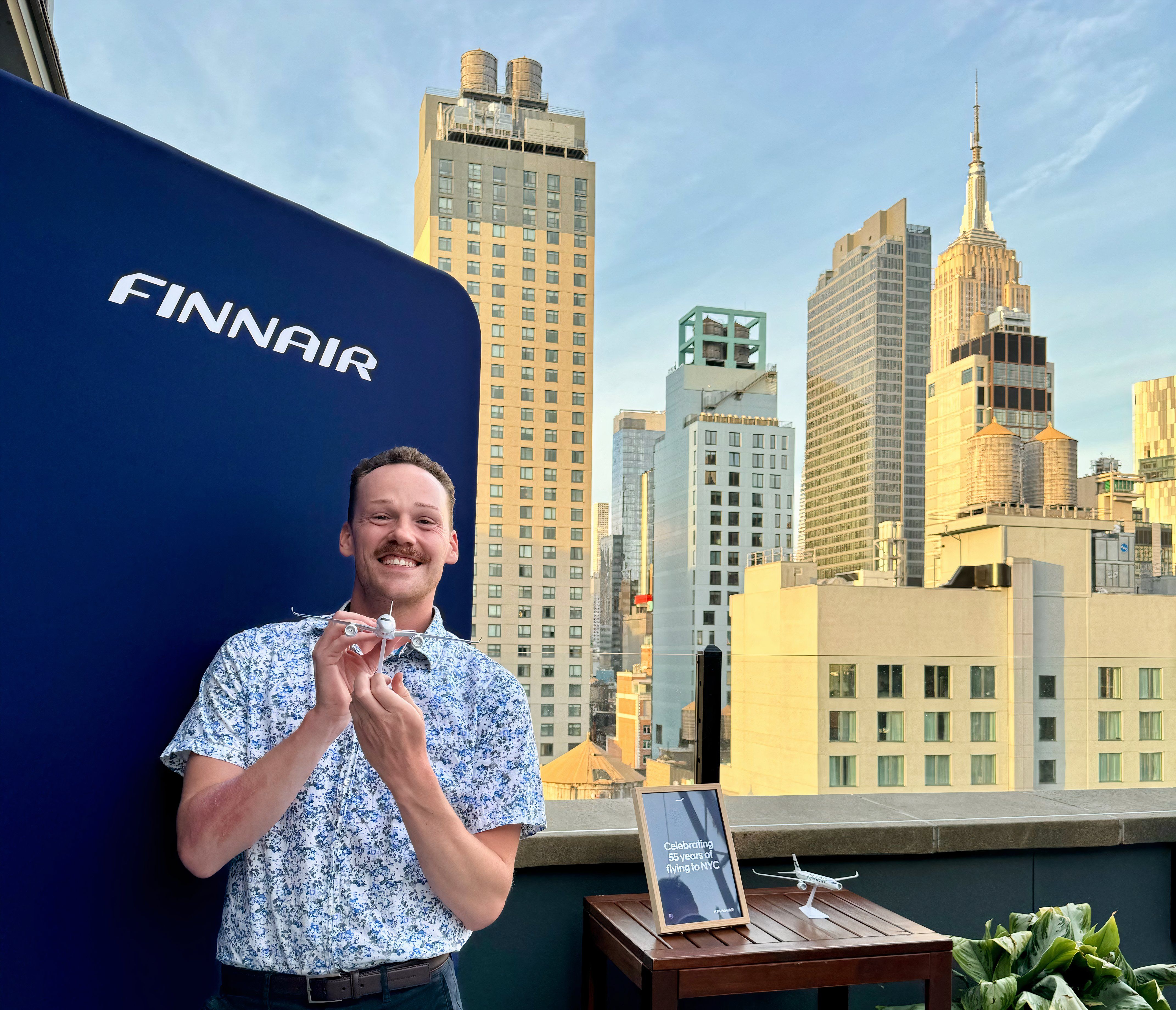 Simple Flying's Lead US Journalist at the Finnair event celebrating 55 years of the oneworld alliance carrier serving New York City at the Sandbar Rooftop, May 2024