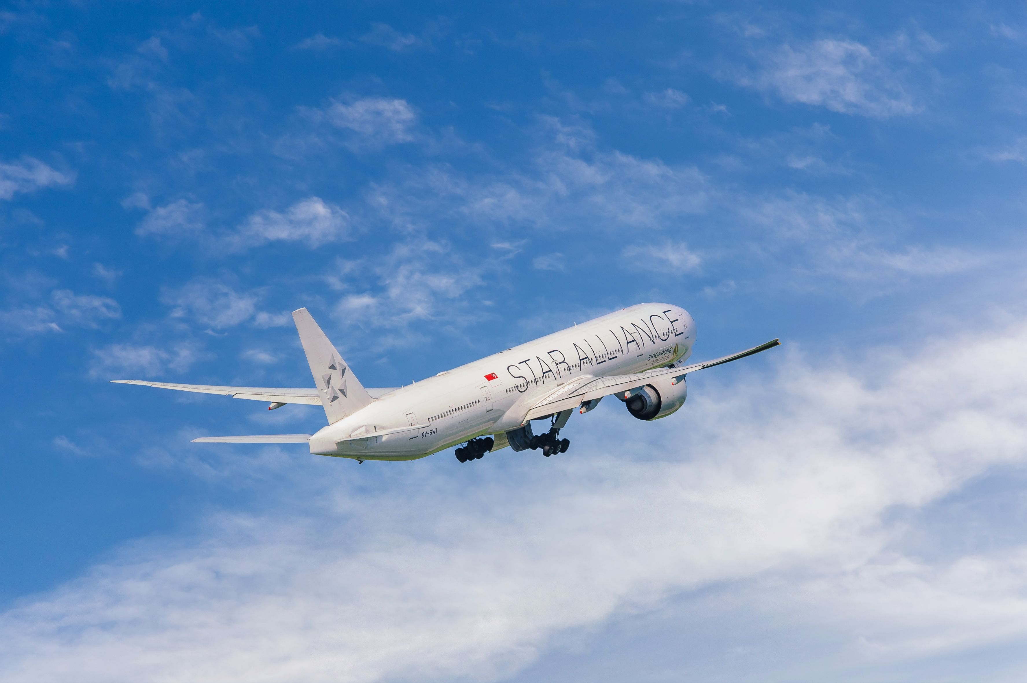 Singapore Airlines Boeing 777-300ER with the Star Alliance livery departing Moscow shutterstock_2152849225